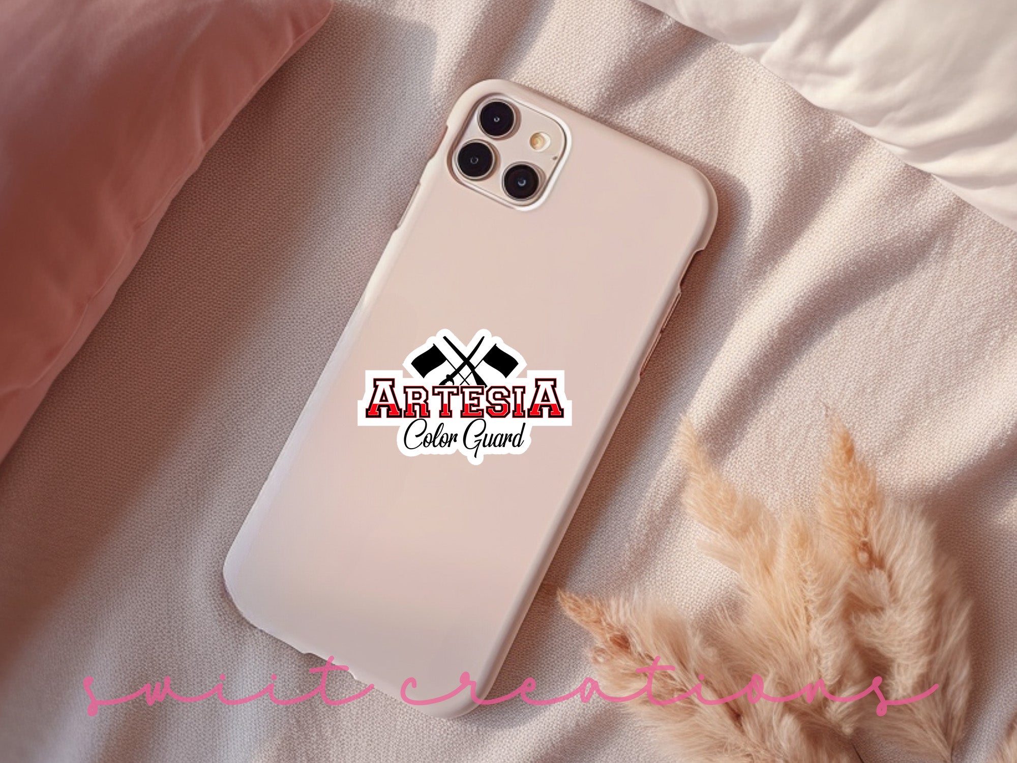 a white phone case with a sticker on it