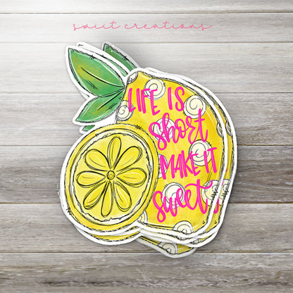a cutout of a lemon with the words life is short make it easy