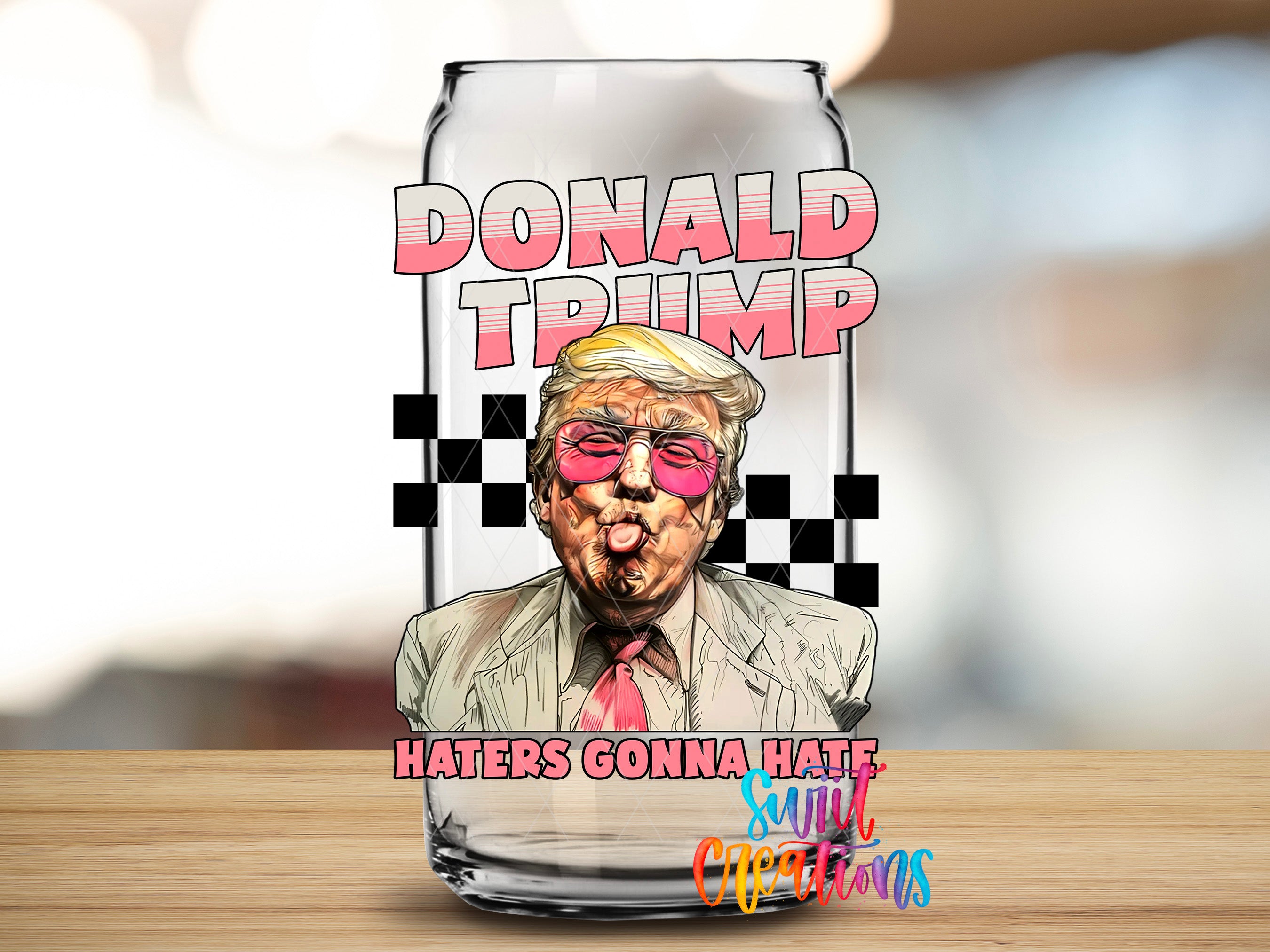 a can with a stylized illustration of a man wearing sunglasses and a tie, along with the text "DONALD TRUMP" and "HATERS GONNA HATE" printed on it.
