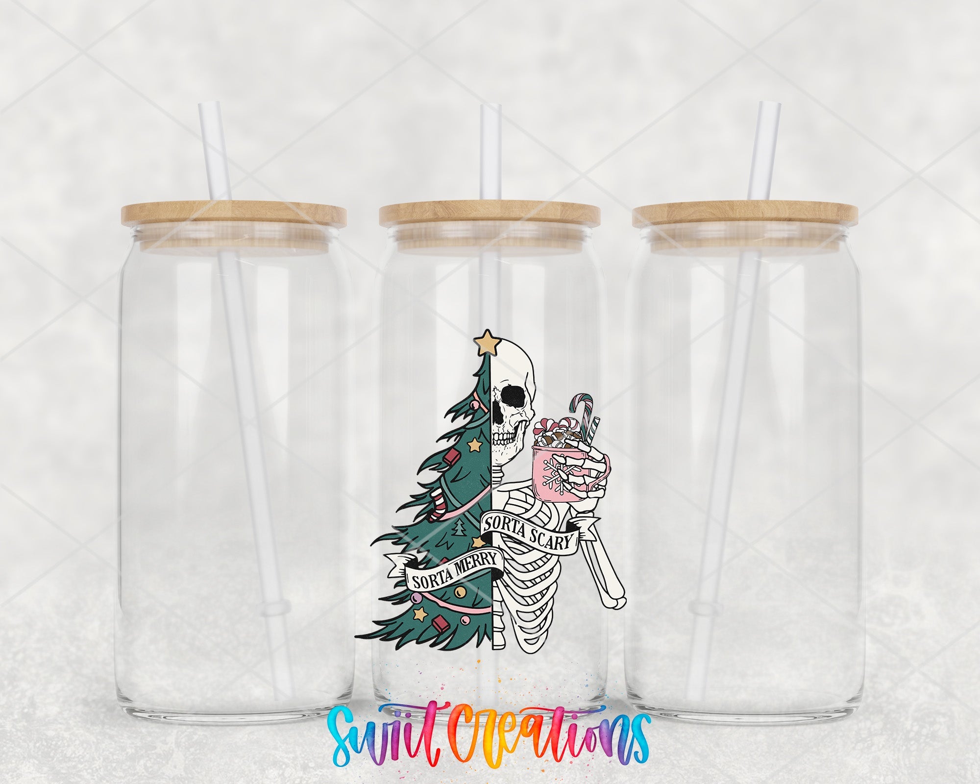 a couple of glasses with a skeleton and a christmas tree on them