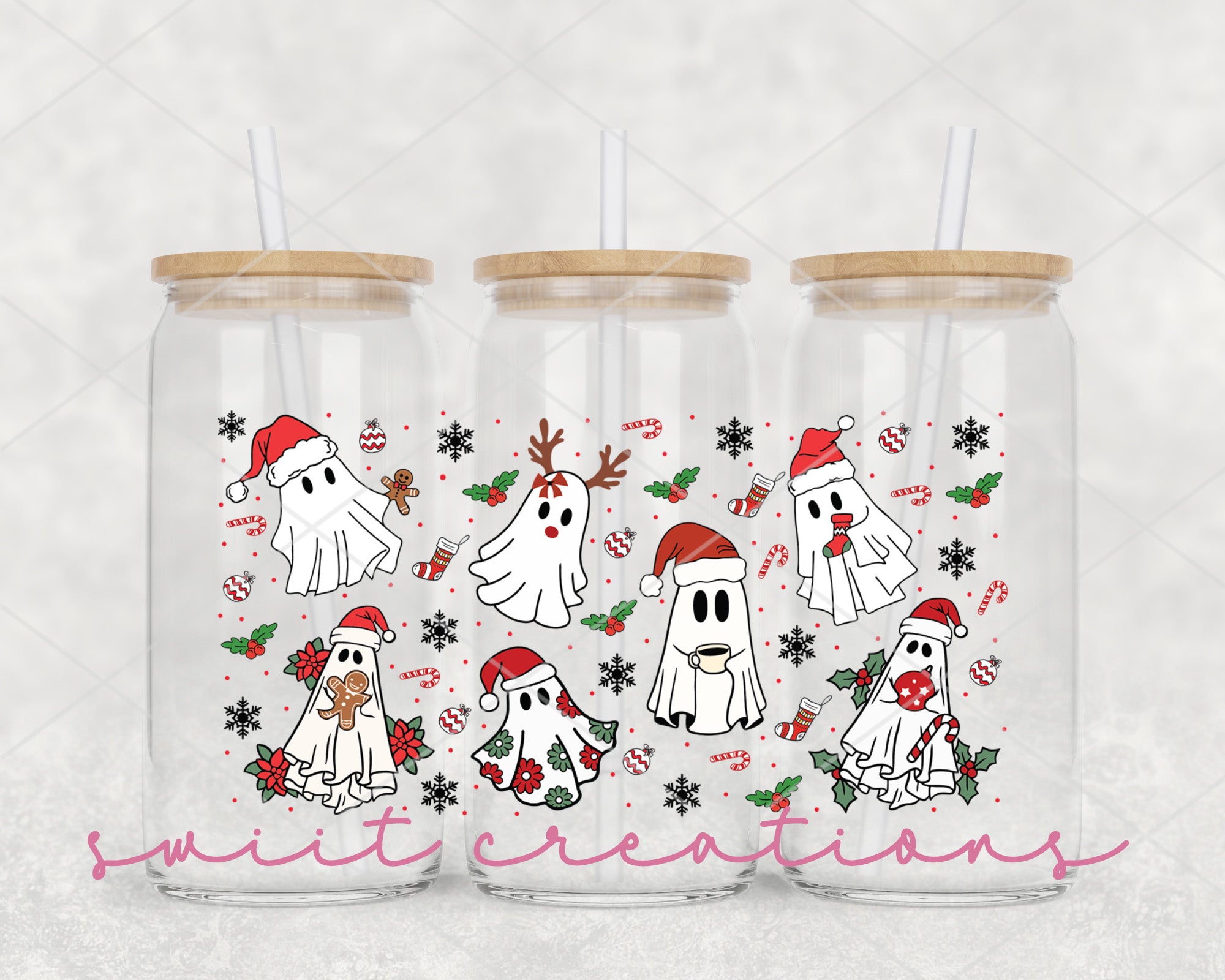 a set of three glass cups with stickers on them