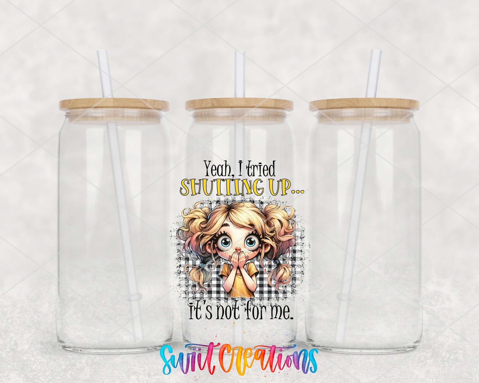 two clear tumblers with a cartoon girl on them
