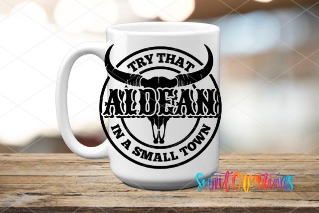 a white coffee mug with a bull's head on it