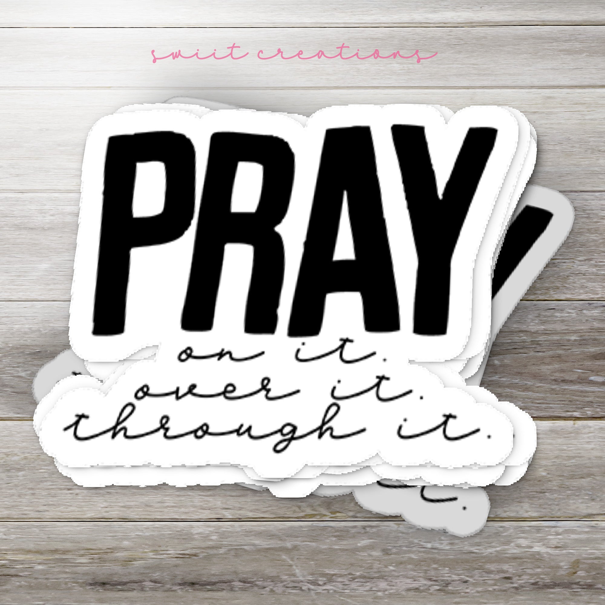 a sticker with the words pray on it