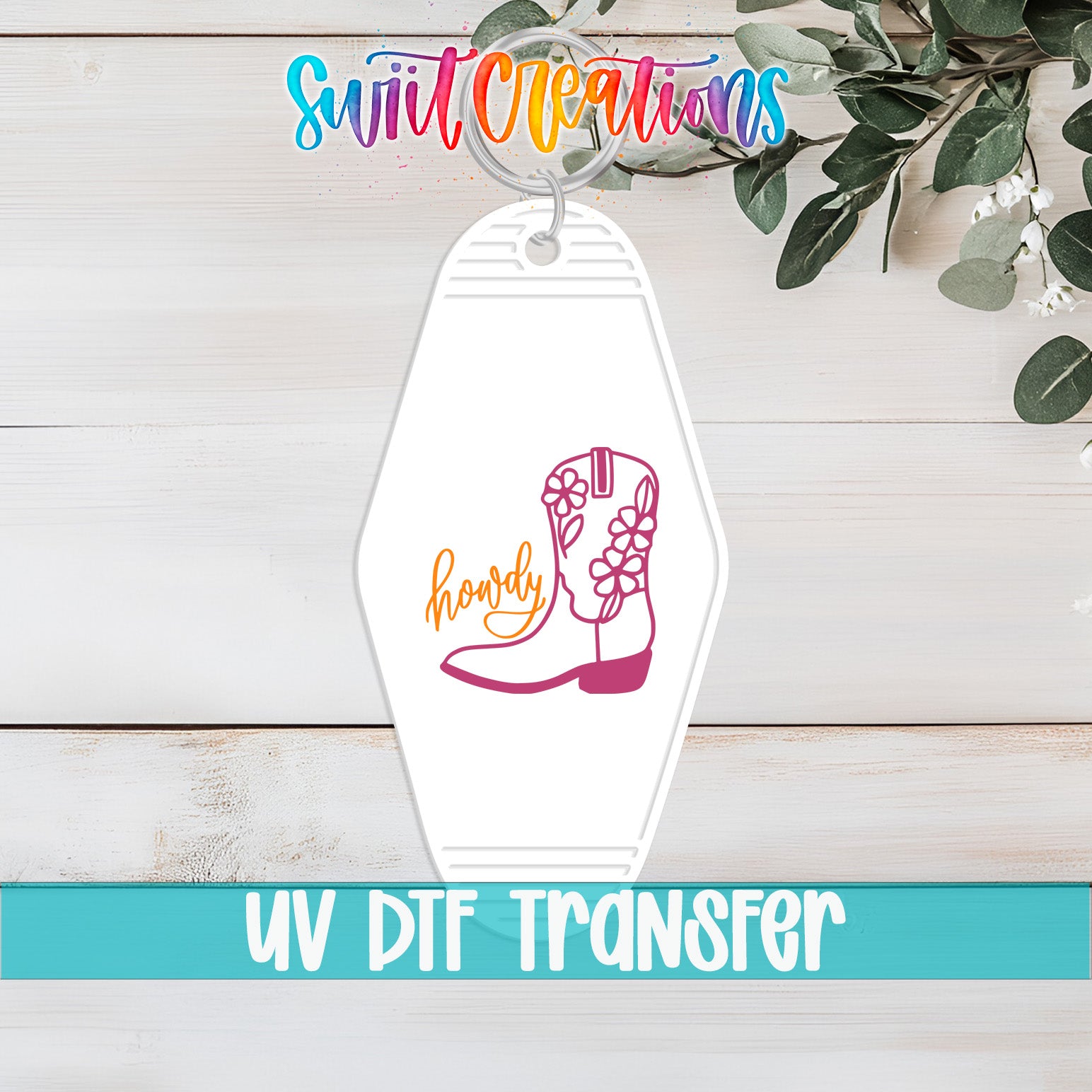 A keychain with a graphic of a cowboy boot and the word "howdy" printed on it, along with a colorful logo and text.