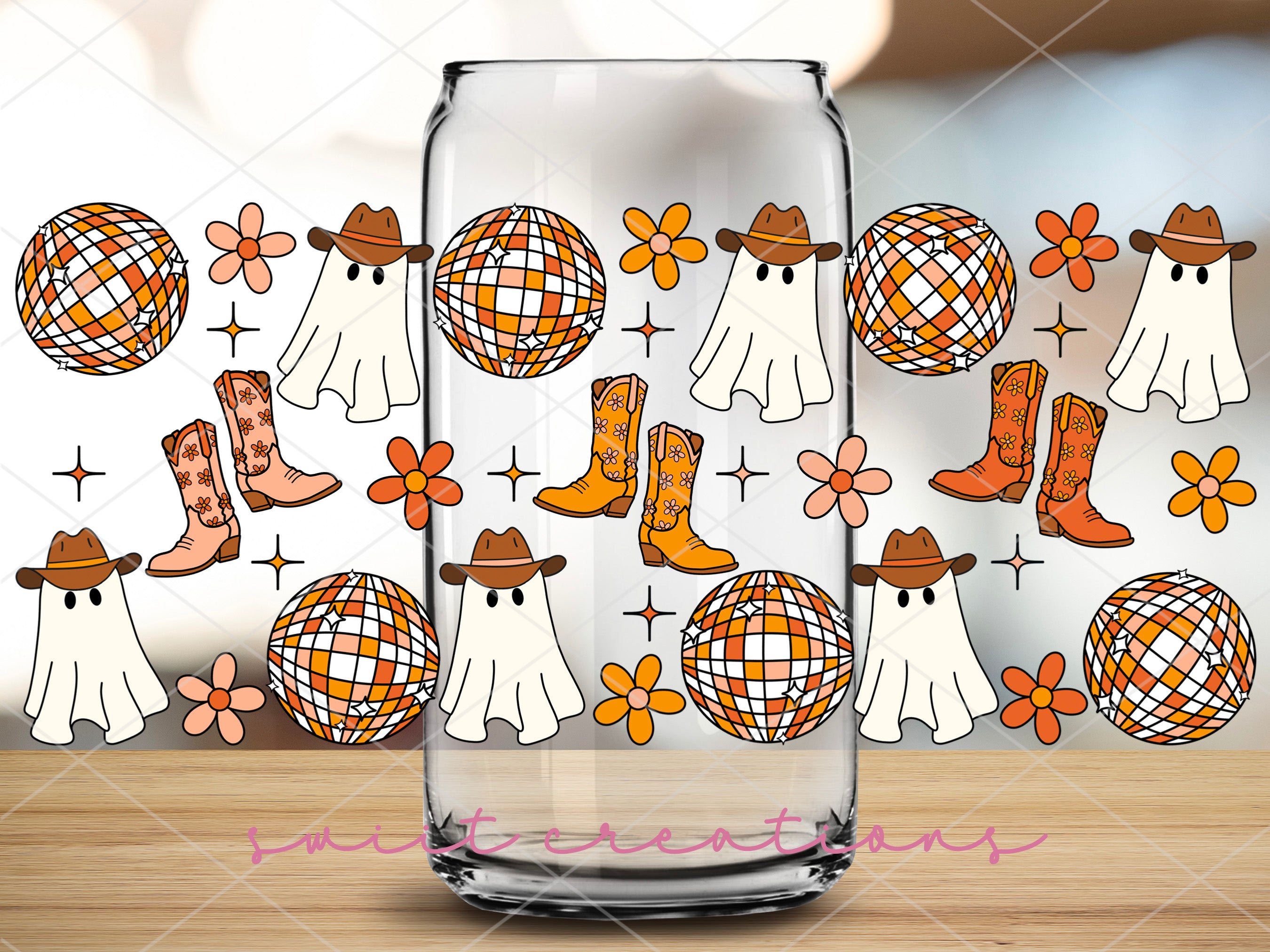 a glass with a pattern of boots and hats on it