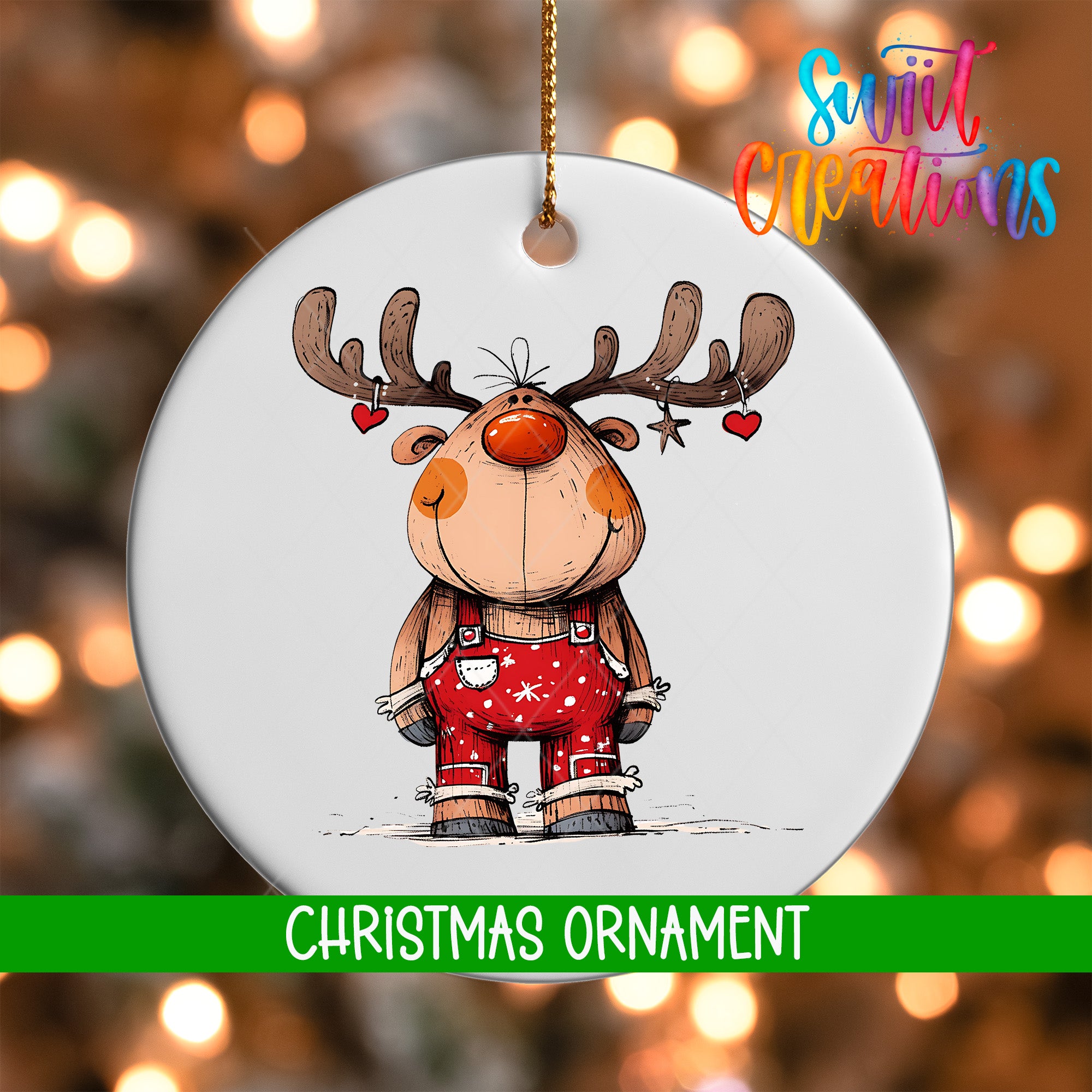 A white Christmas ornament featuring a cartoon reindeer wearing overalls and antlers, with a red heart on its ear.