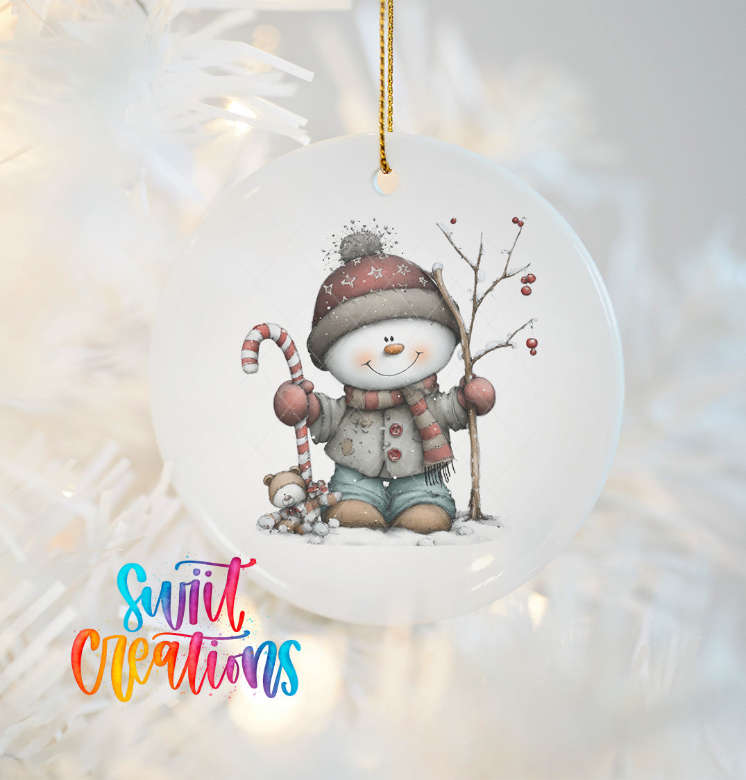 A snowman ornament with a candy cane and a small teddy bear, set against a snowy background.
