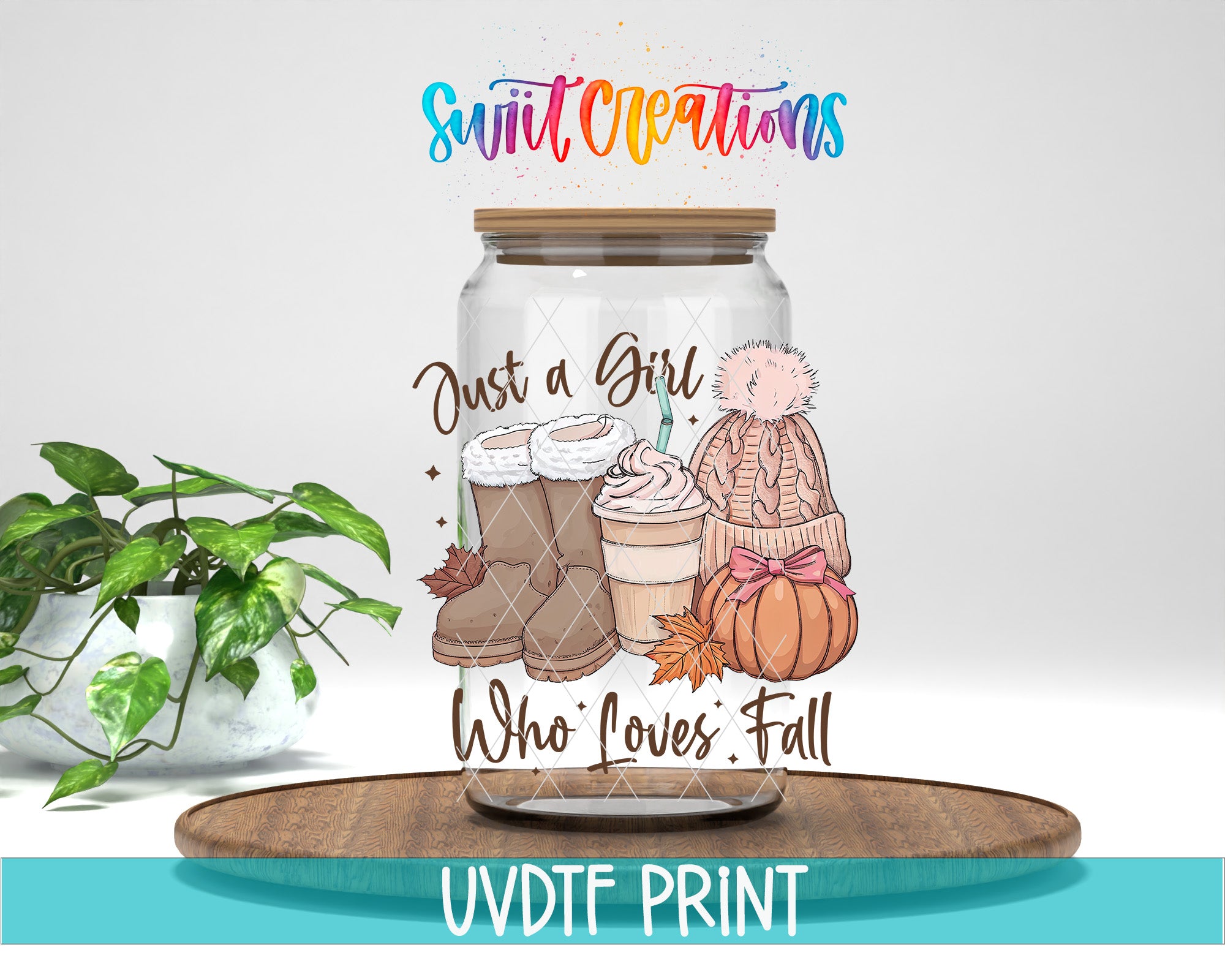 A glass jar with a printed design on it, featuring a pumpkin, boots, and a cup of coffee, along with the text "Just a Girl Who Loves Fall" and "Swift Creations" written above it.