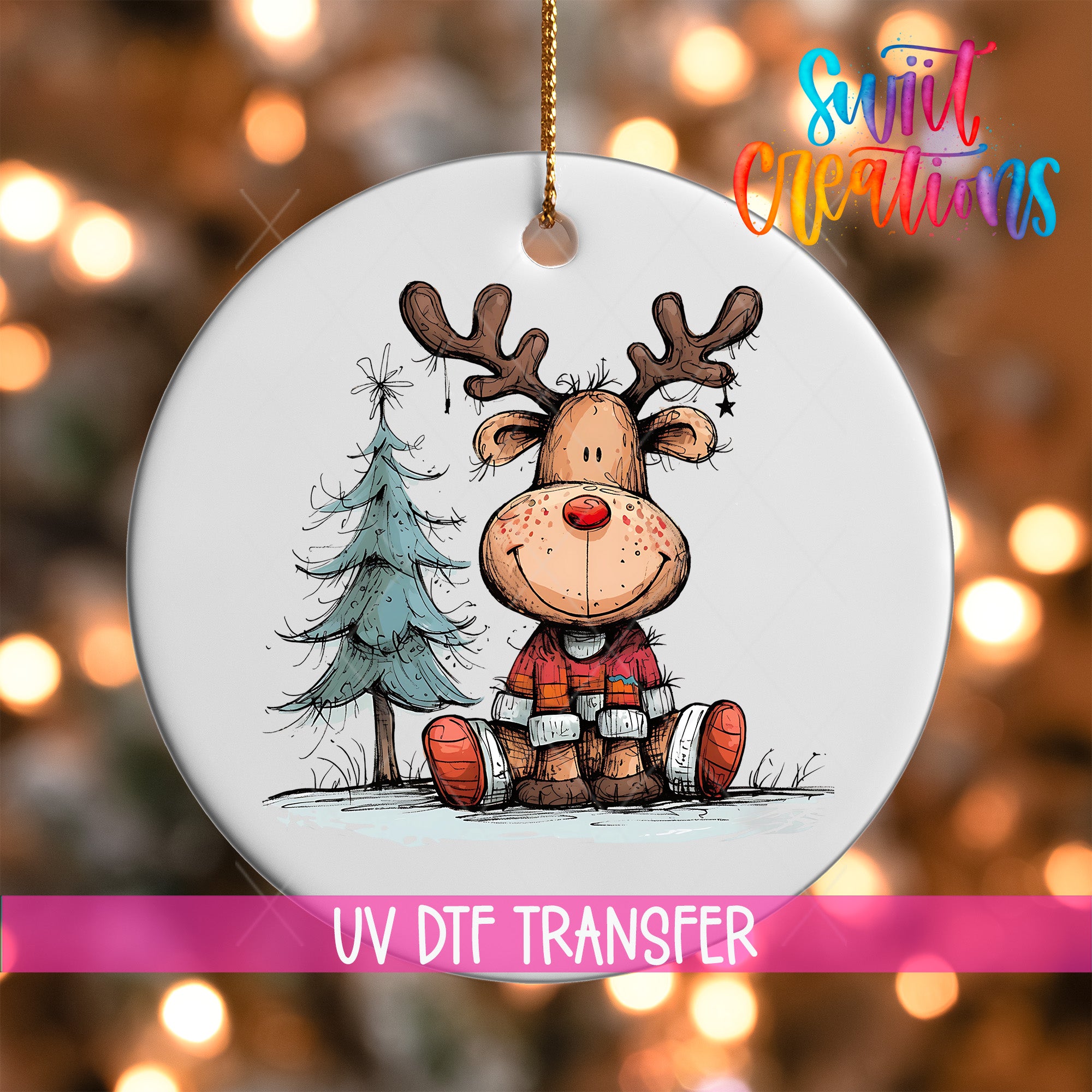 A white ornament featuring a cartoon reindeer sitting next to a Christmas tree.
