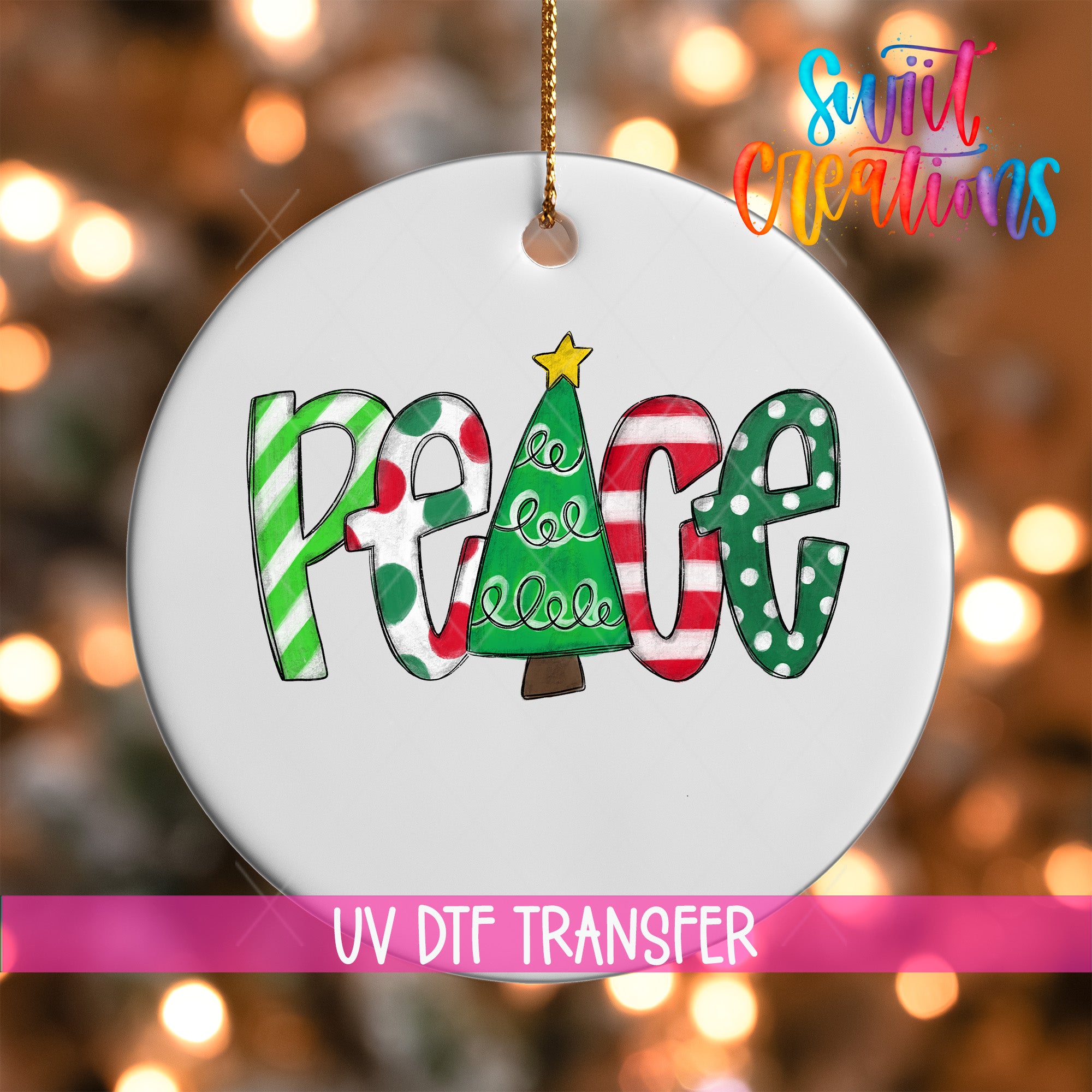 A white ornament with the word "Peace" written in colorful letters, featuring a Christmas tree design.