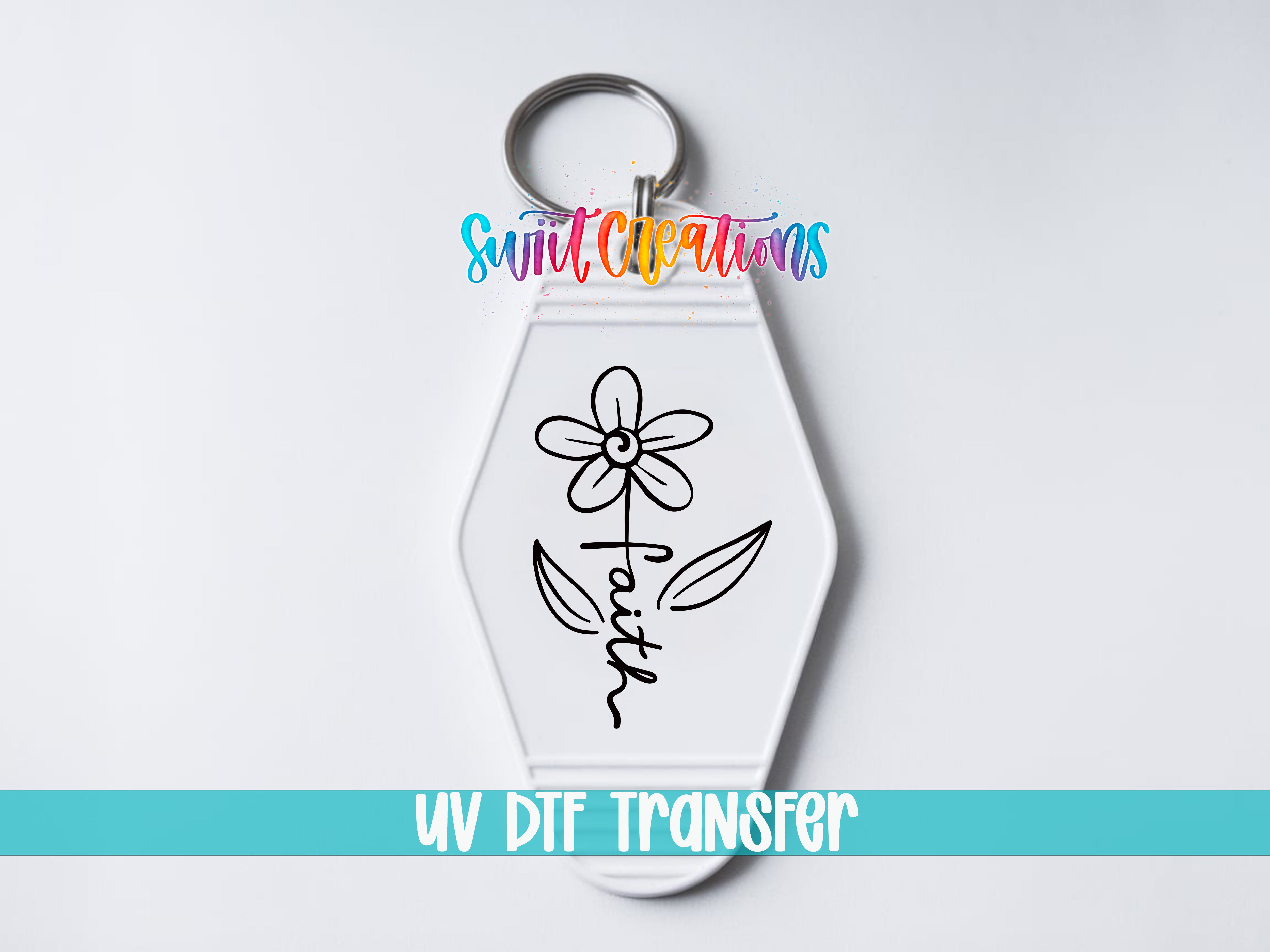 A keychain with a flower design and the word "Faith" written on it.
