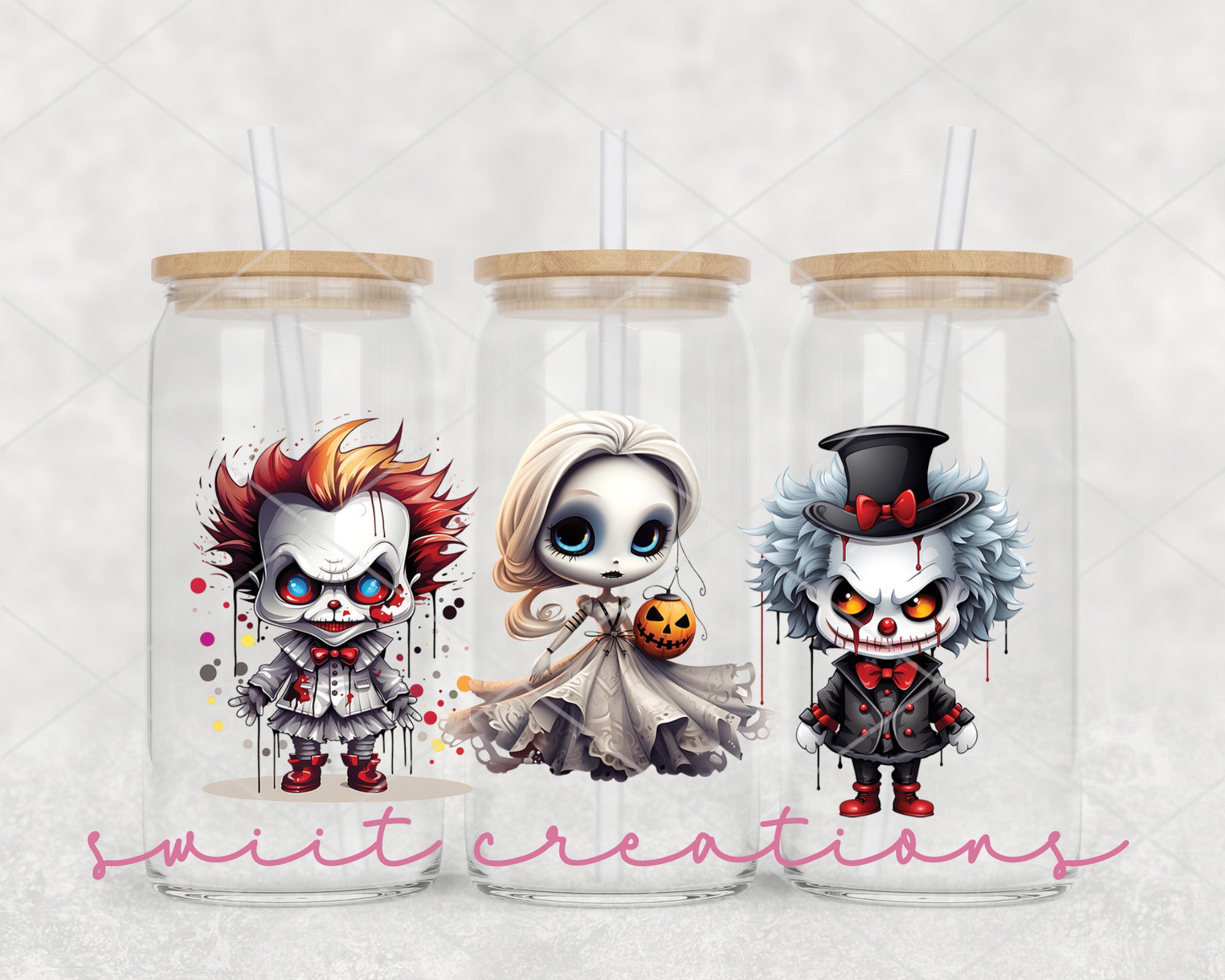 a couple of cute little dolls inside of a glass