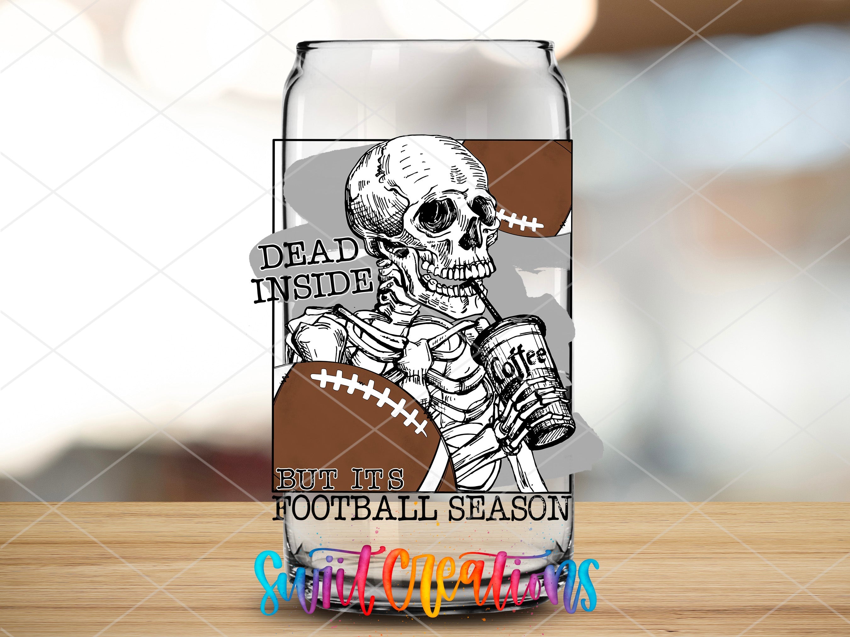a beer glass with a skeleton holding a football