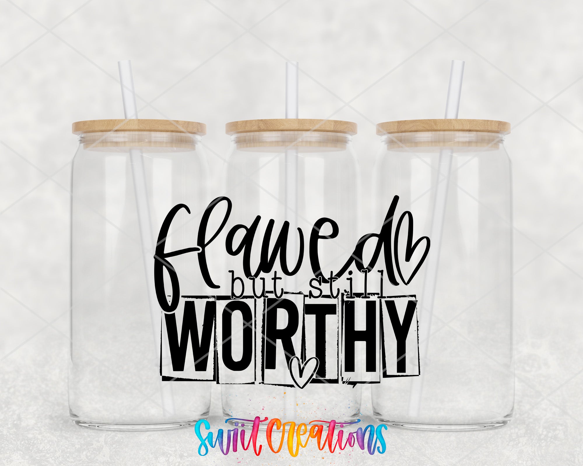 a couple of glass jars sitting on top of a table