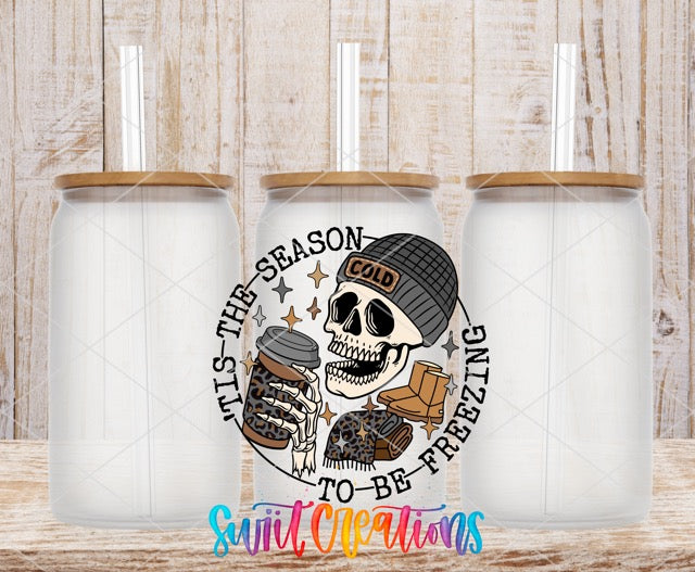 two white coffee mugs with a skull on them