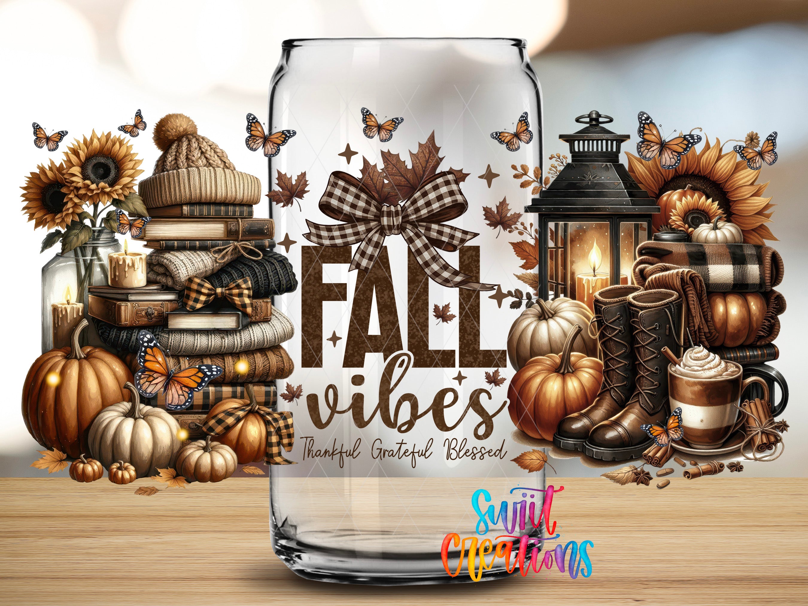 a glass jar filled with autumn-themed items, including pumpkins, sunflowers, and a lantern, along with the text "FALL VIBES" and "Thankful, Gratified, Blessed" printed on it.