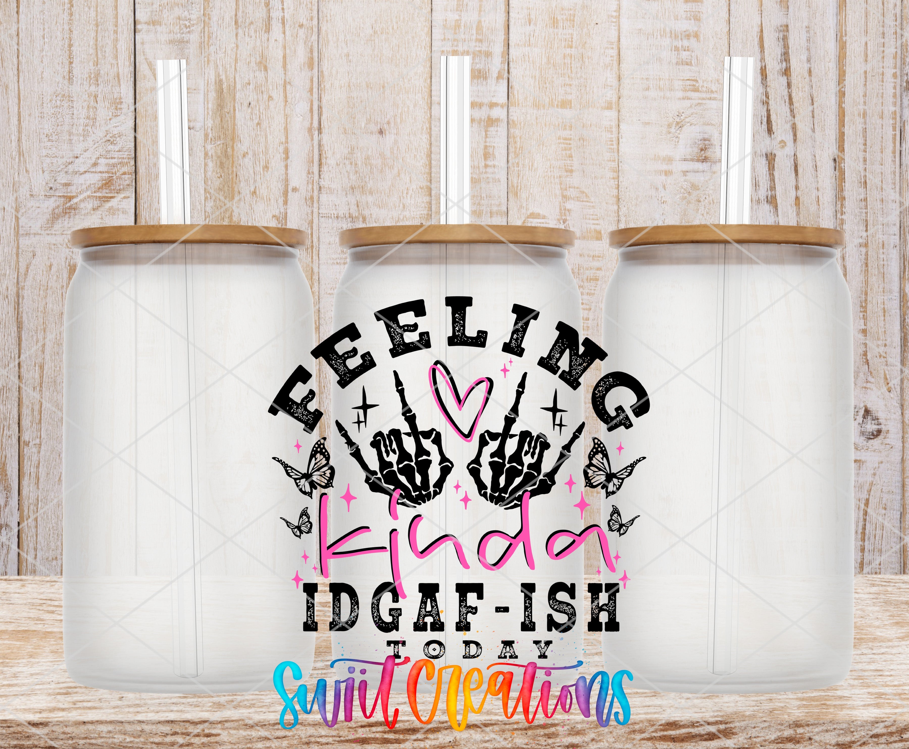 two plastic cups with the words feeling king and igaf - ish on