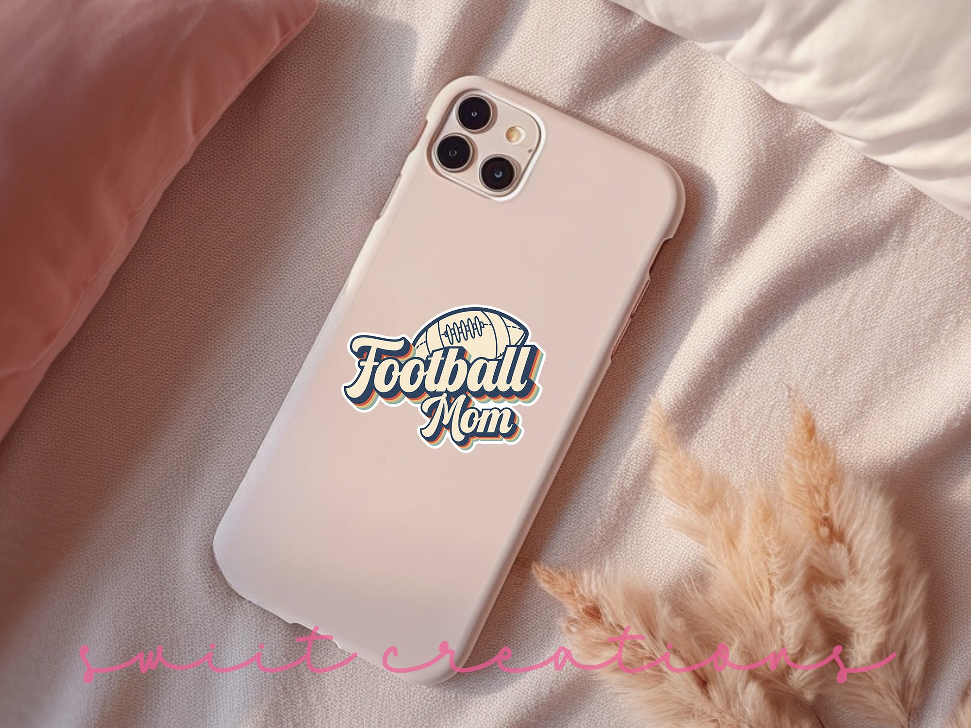 a phone case sitting on top of a bed