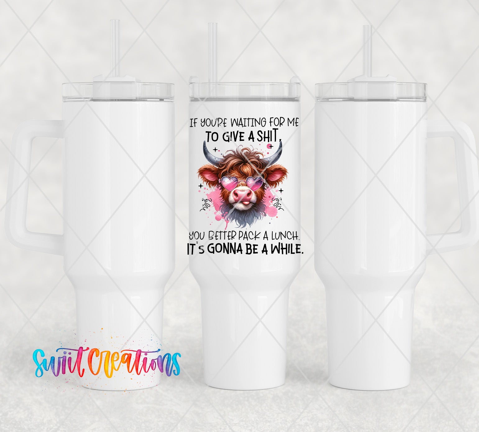 a white travel mug with a picture of a cow on it