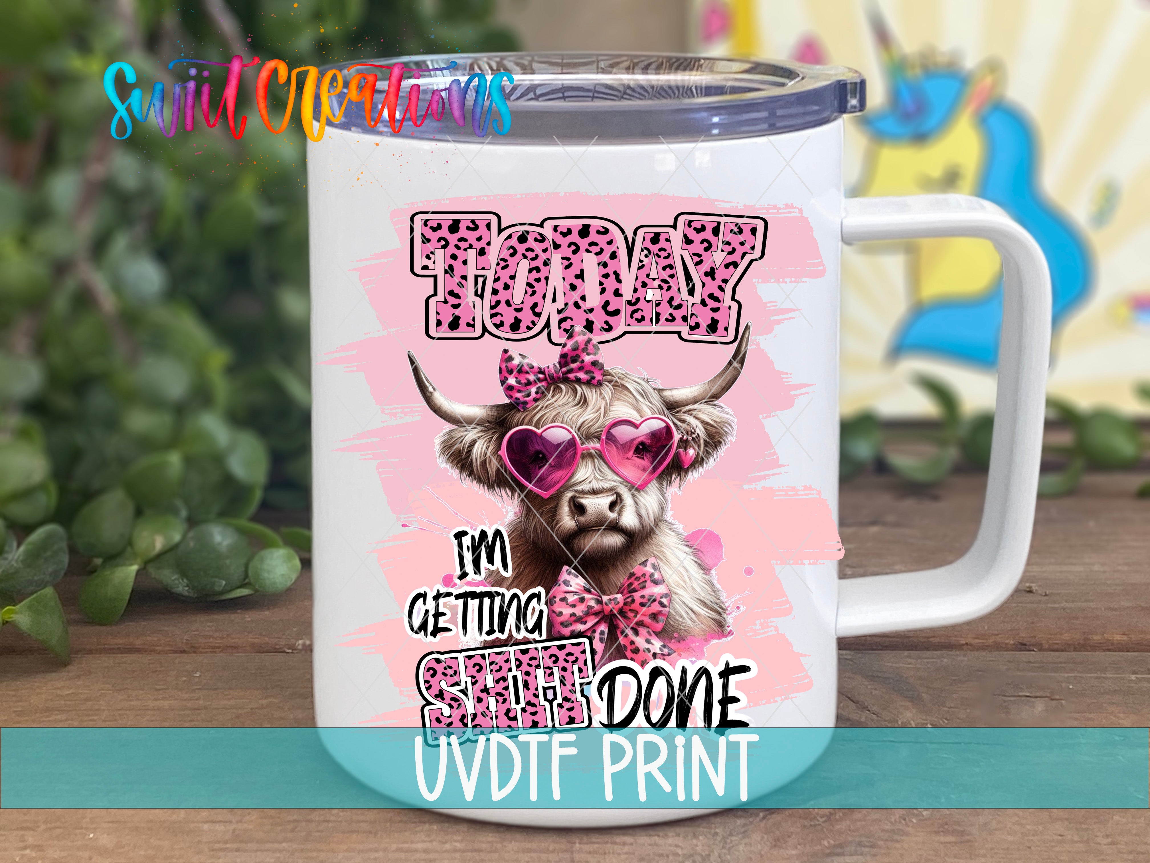 a white coffee mug with a cow wearing sunglasses