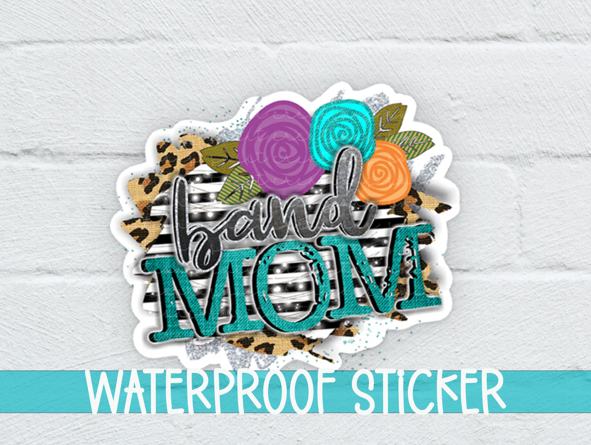 Leopard Floral Band Mom sticker on a white brick background with a waterproof sticker banner