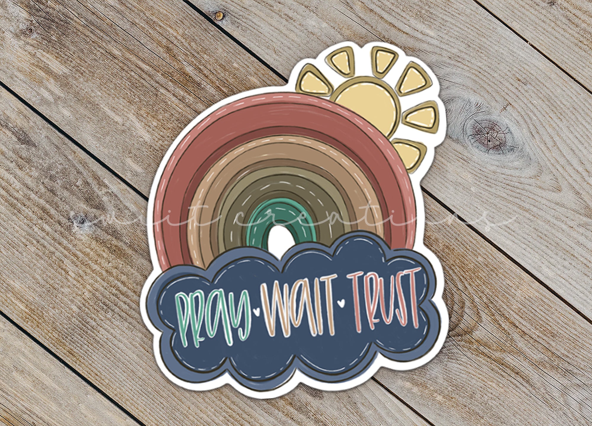 a sticker with a rainbow and a cloud on it