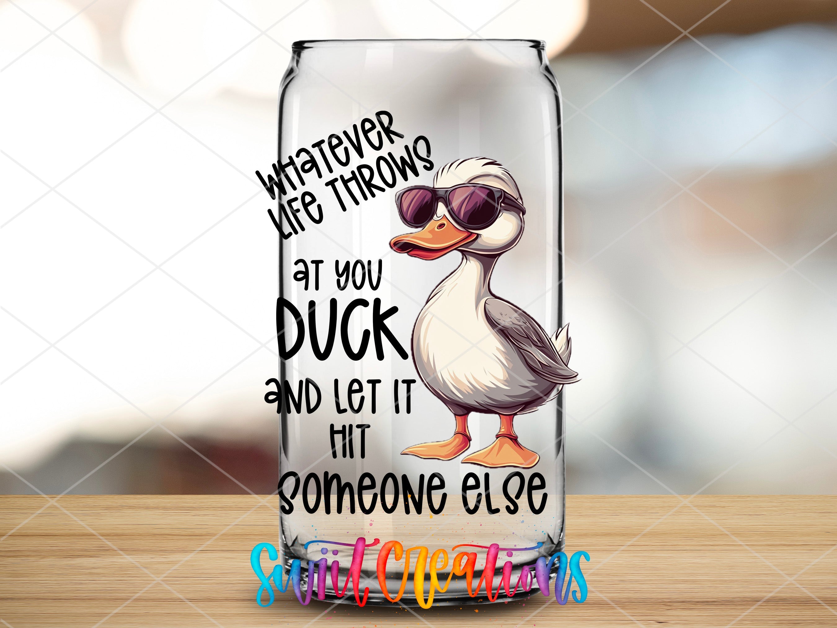 a glass with a duck wearing sunglasses on it