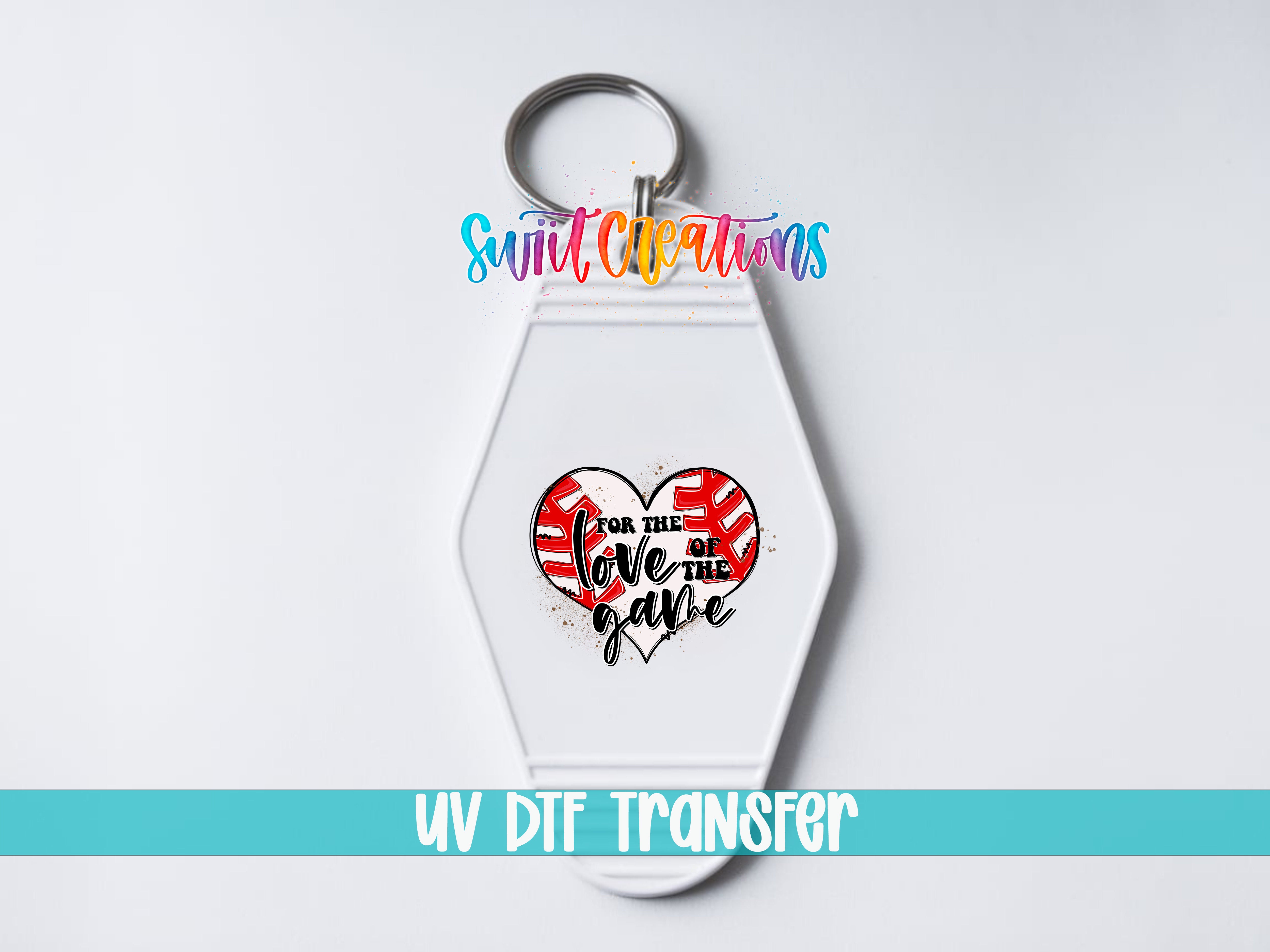 A white keychain with a heart-shaped design and text printed on it.
