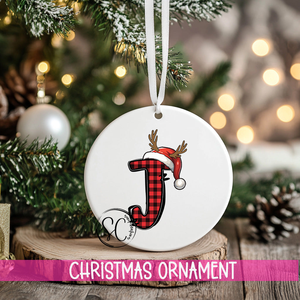 a christmas ornament hanging from a christmas tree