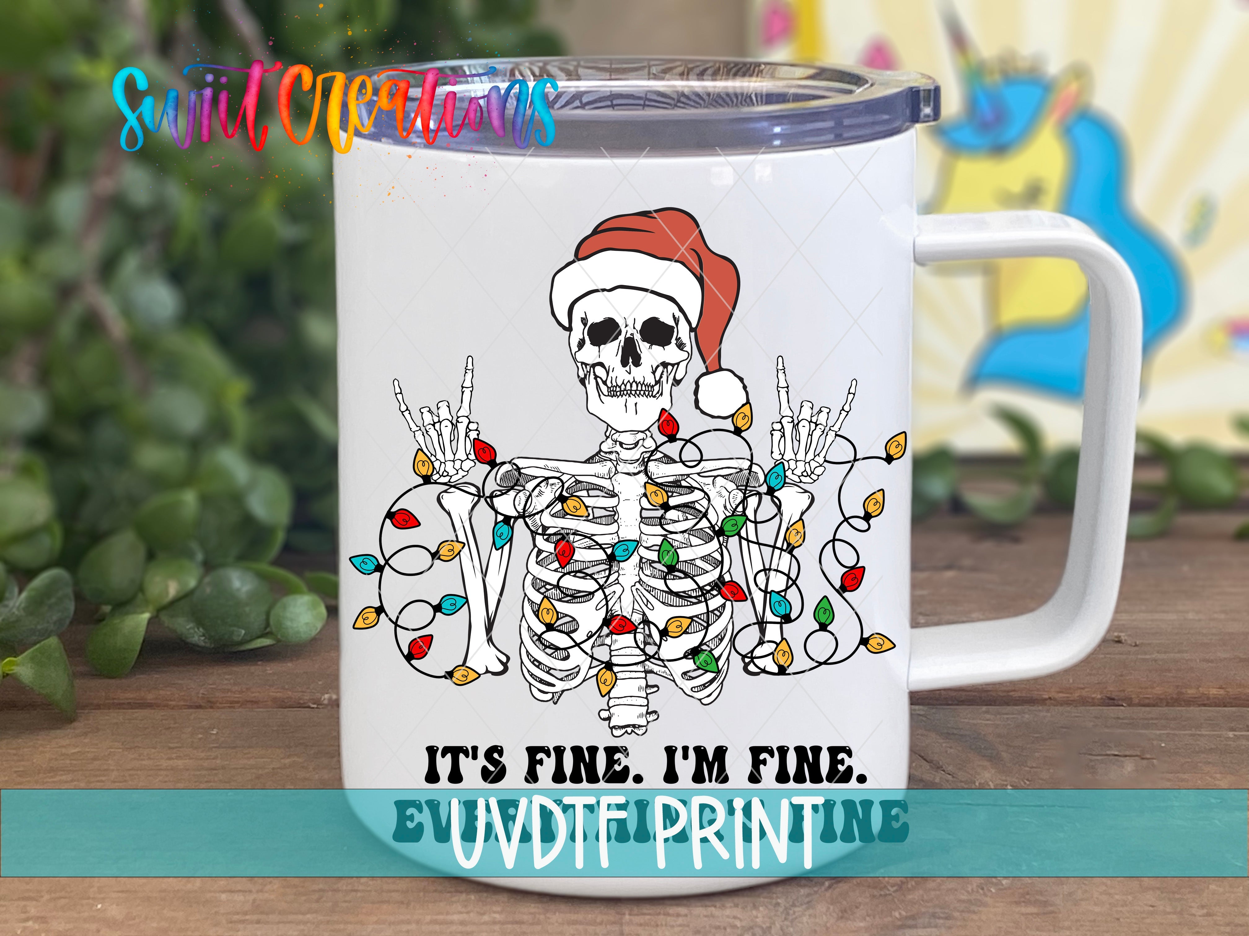 a white coffee mug with a skeleton wearing a santa hat
