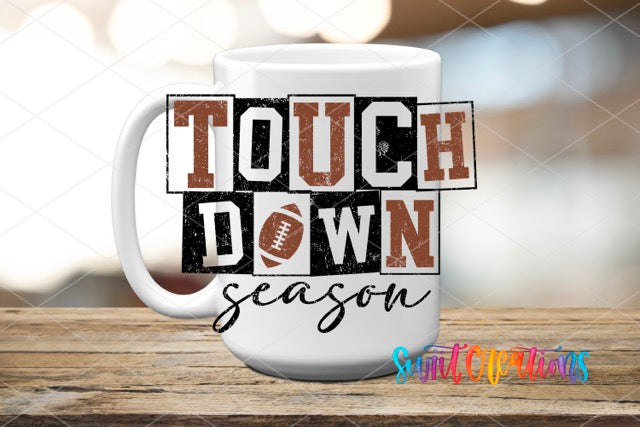 a coffee mug with the words touch down season on it
