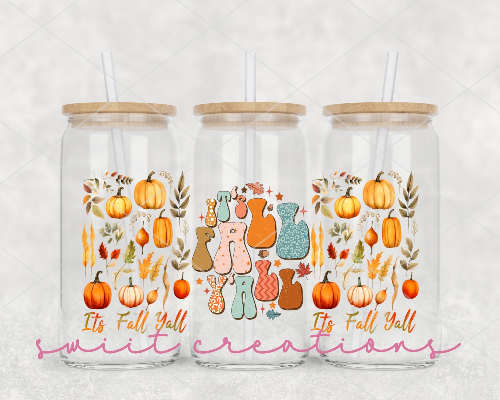 three clear tumblers with fall stickers on them