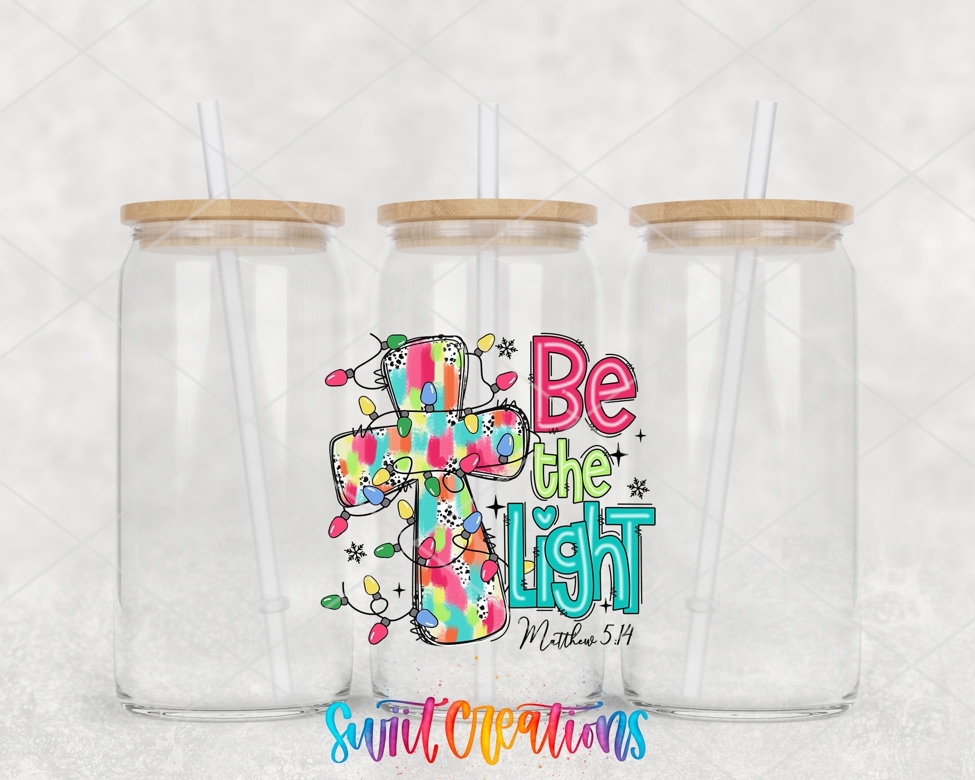 two clear tumblers with the words be the light on them