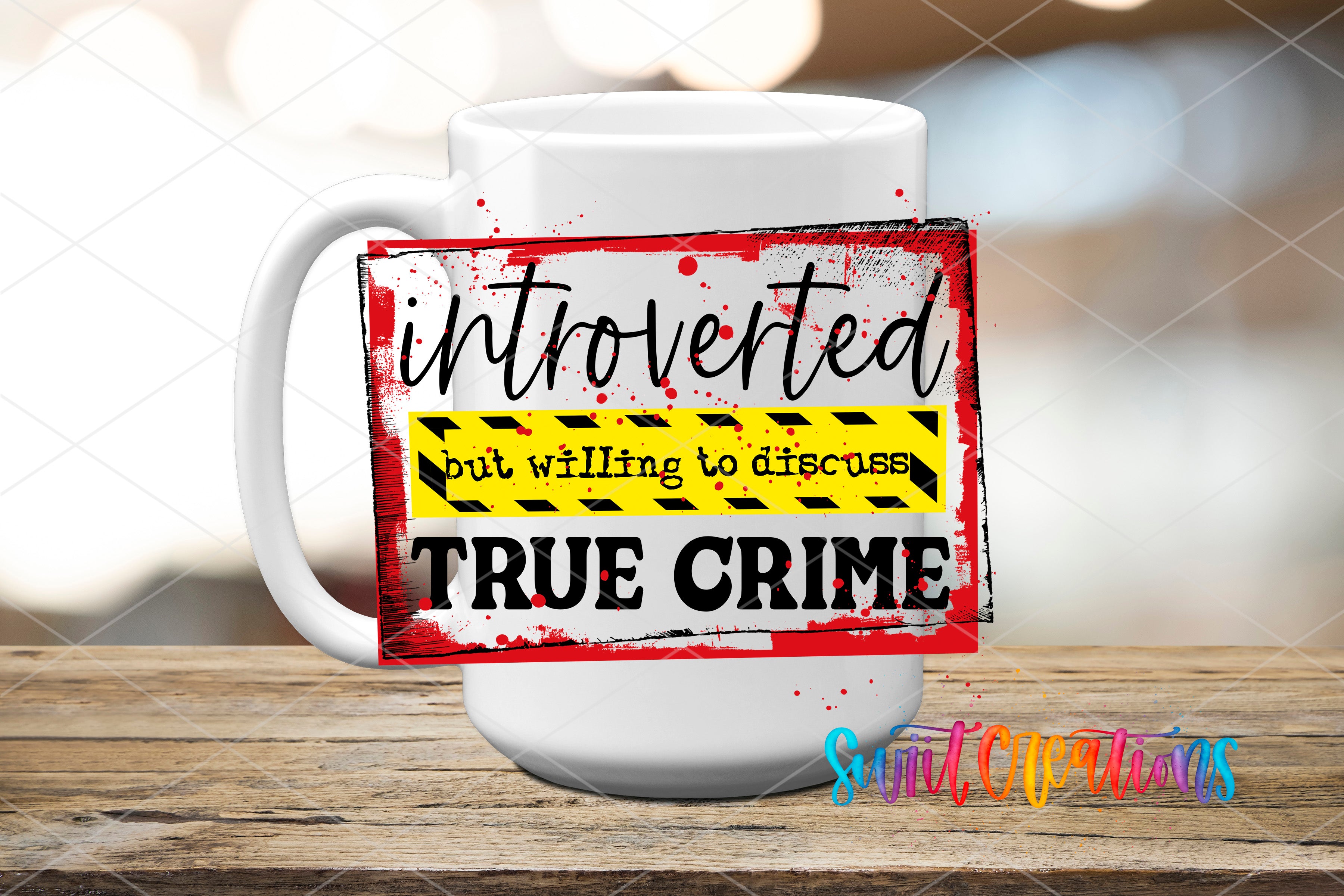 A white mug with a printed design on it, featuring the text "introverted but willing to discuss true crime".