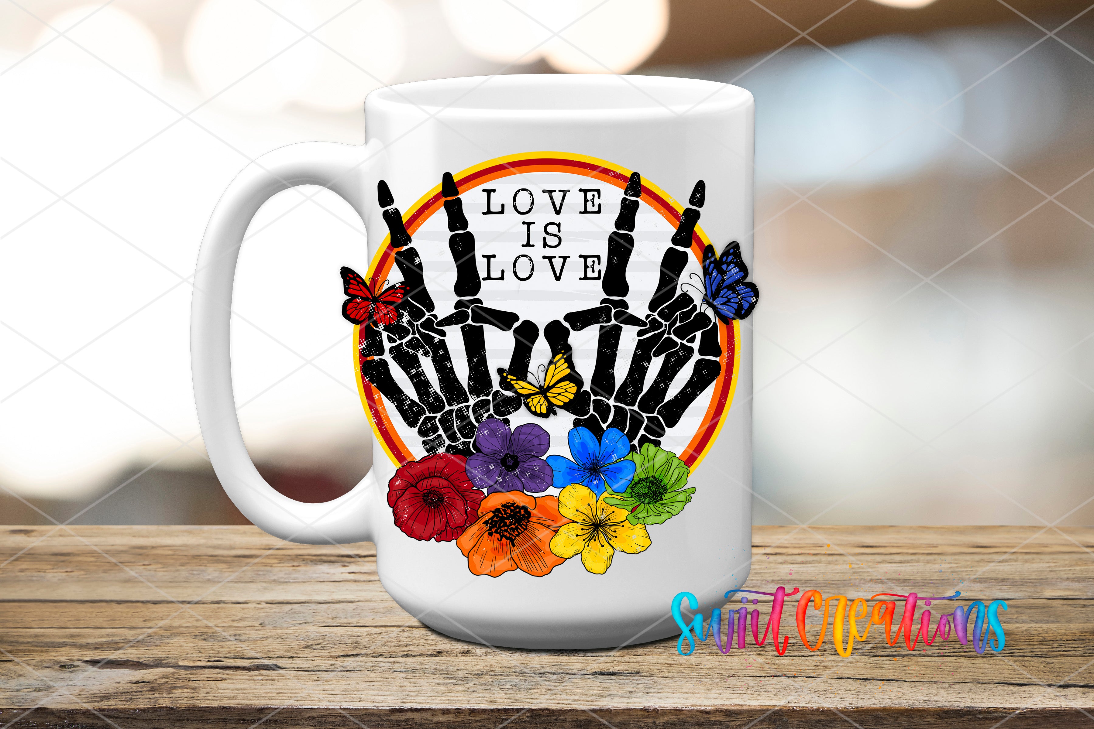 A white ceramic mug with a colorful design featuring a skeleton hand holding a flower and butterflies, surrounded by a circular border with the text "LOVE IS LOVE" and a rainbow-colored border.