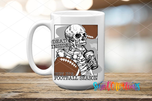 a coffee mug with a skeleton holding a football