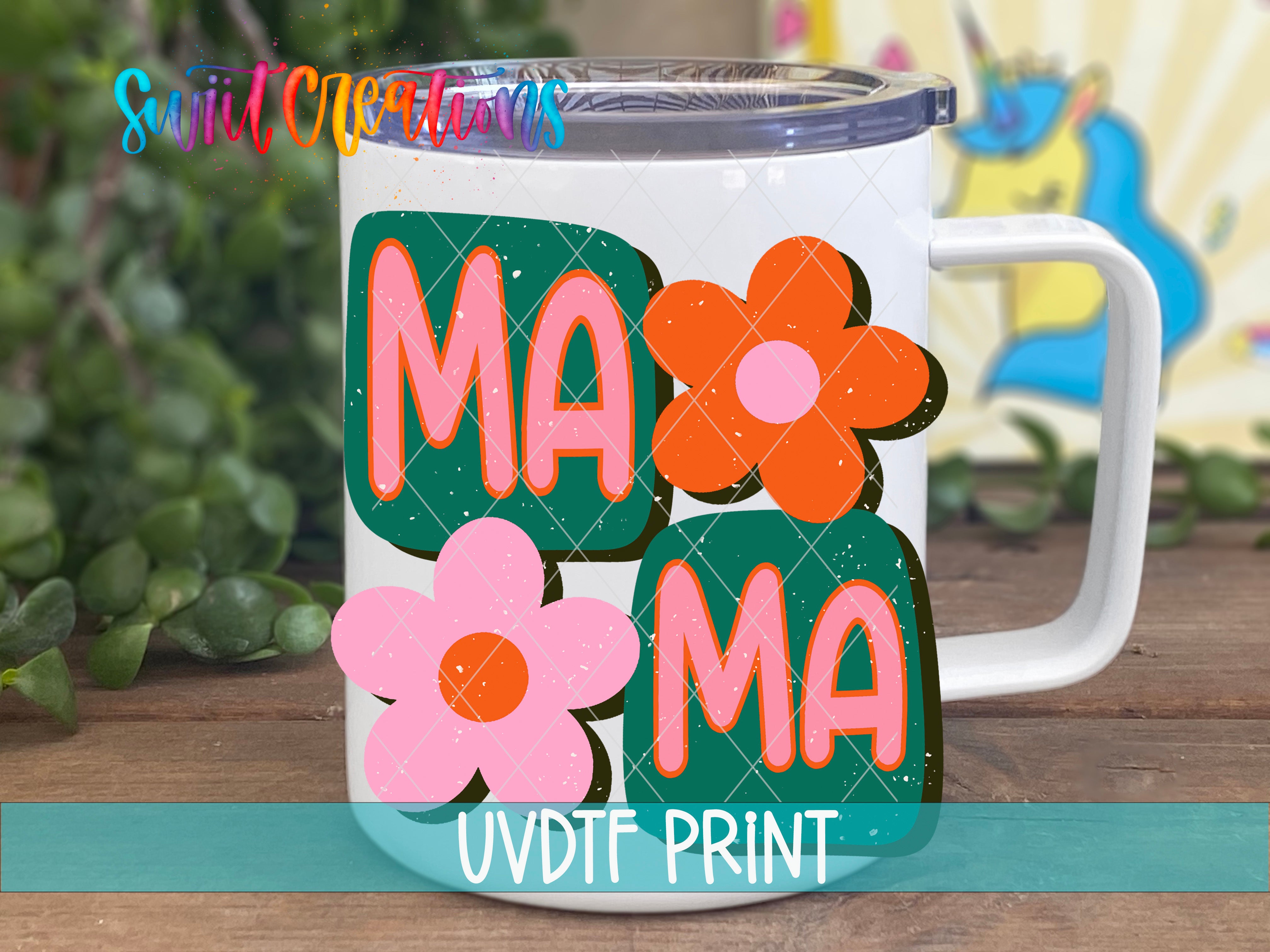a white coffee mug with a flower design on it