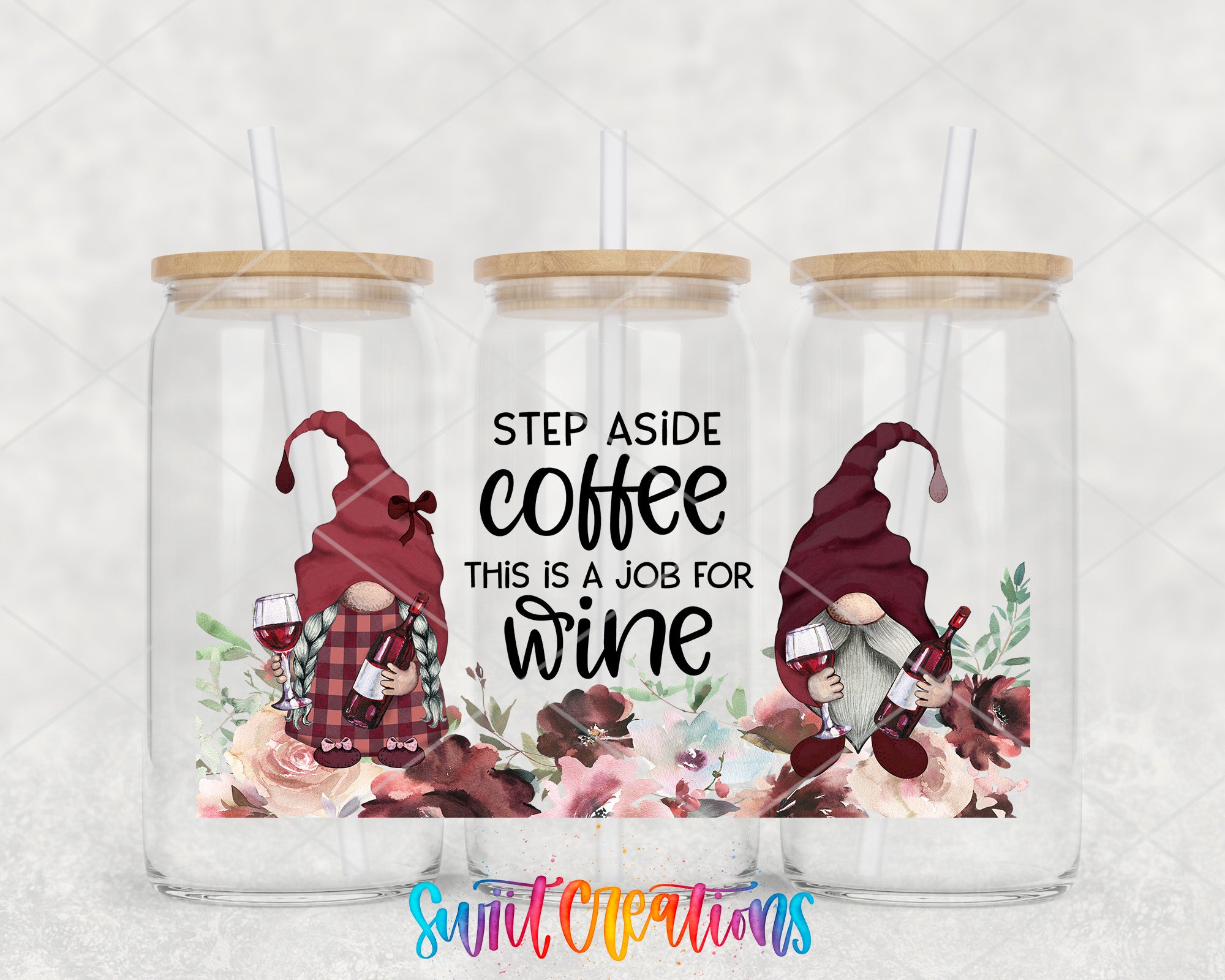 three glass tumblers with gnome-like designs and text printed on them.