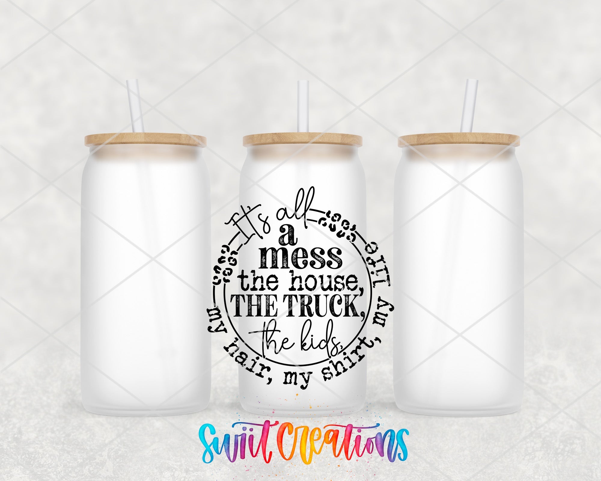 two mason jars with straws on top of them