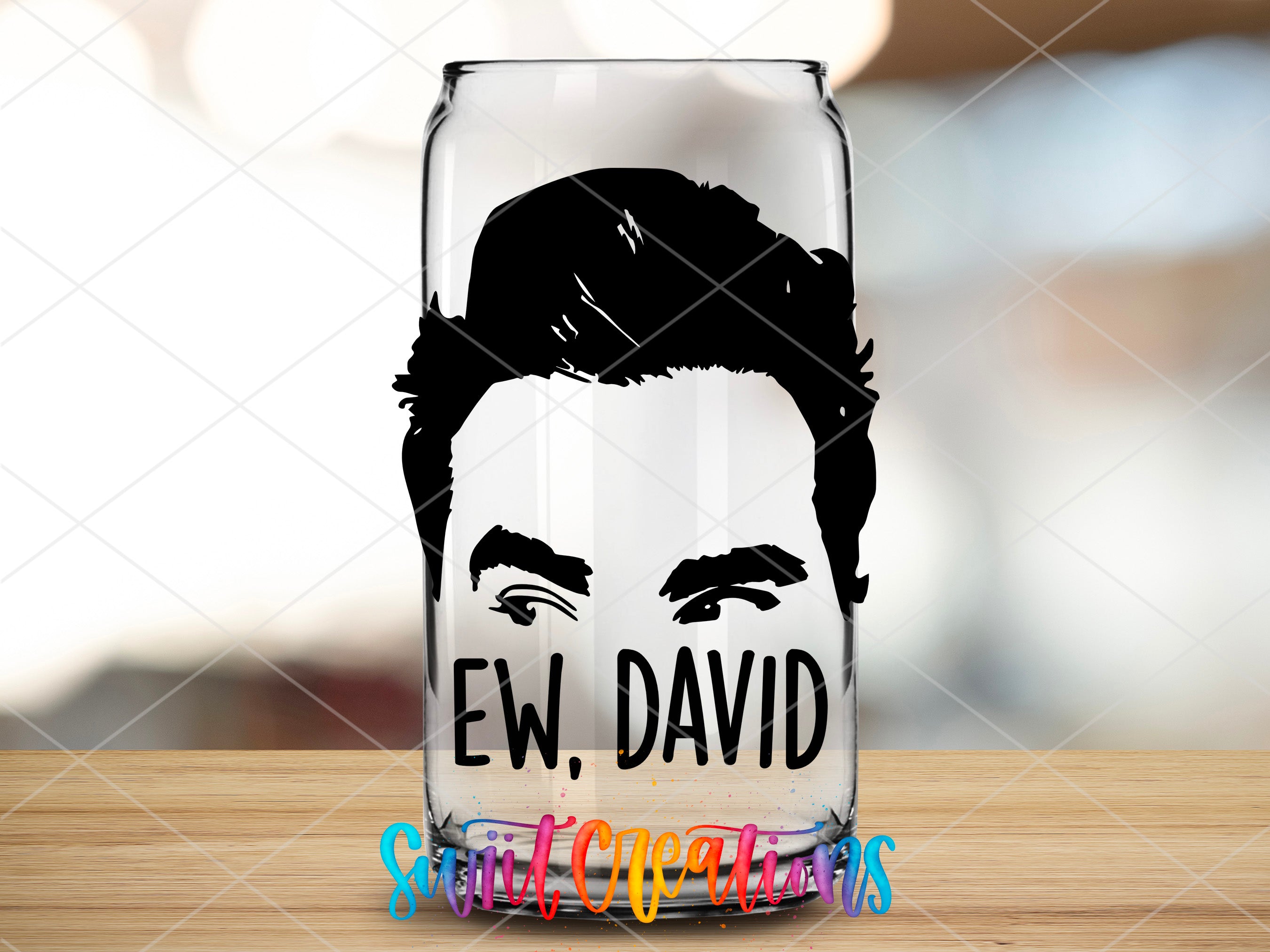 a glass with a picture of a man's face on it