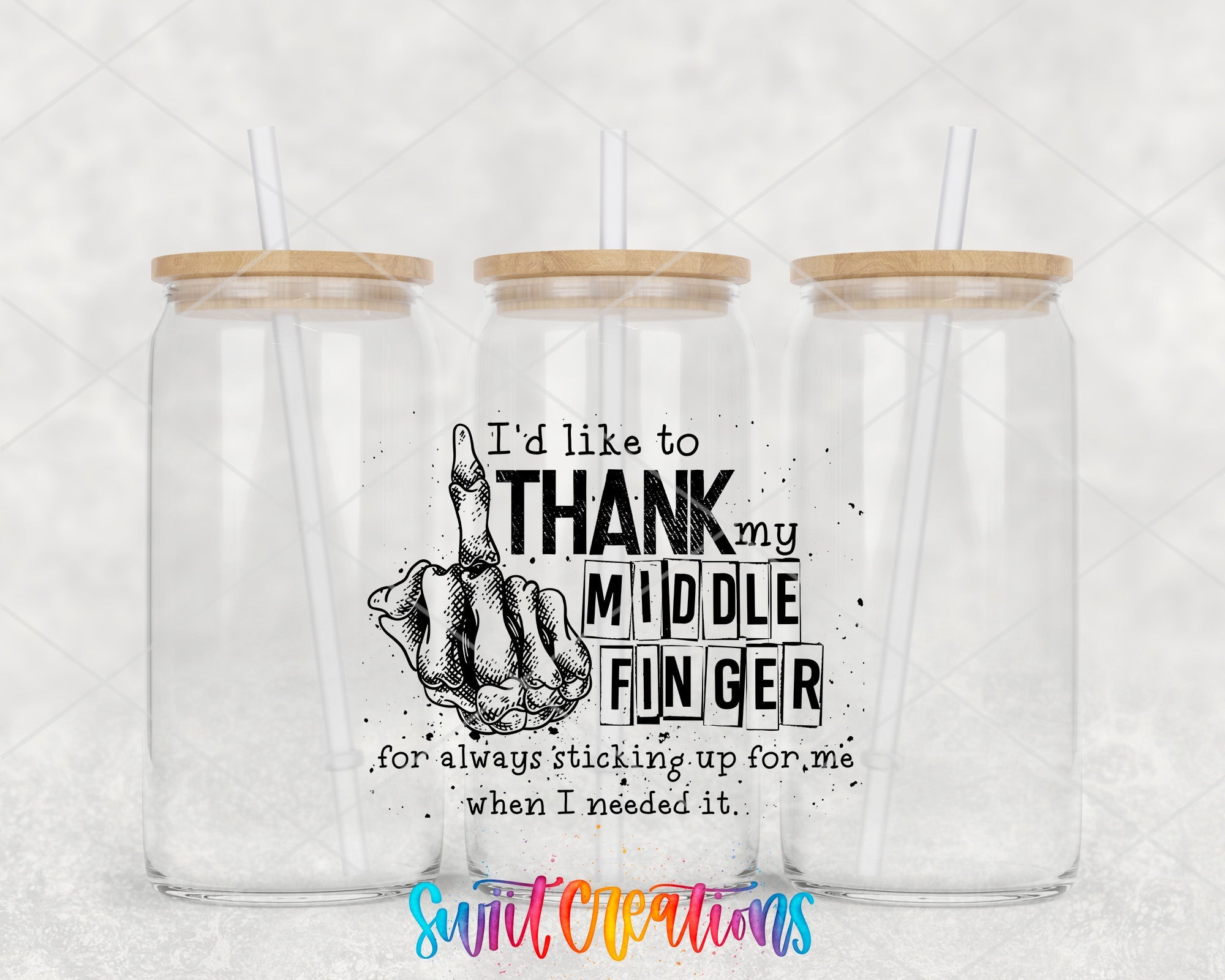 two clear tumblers with wooden lids with a saying on them