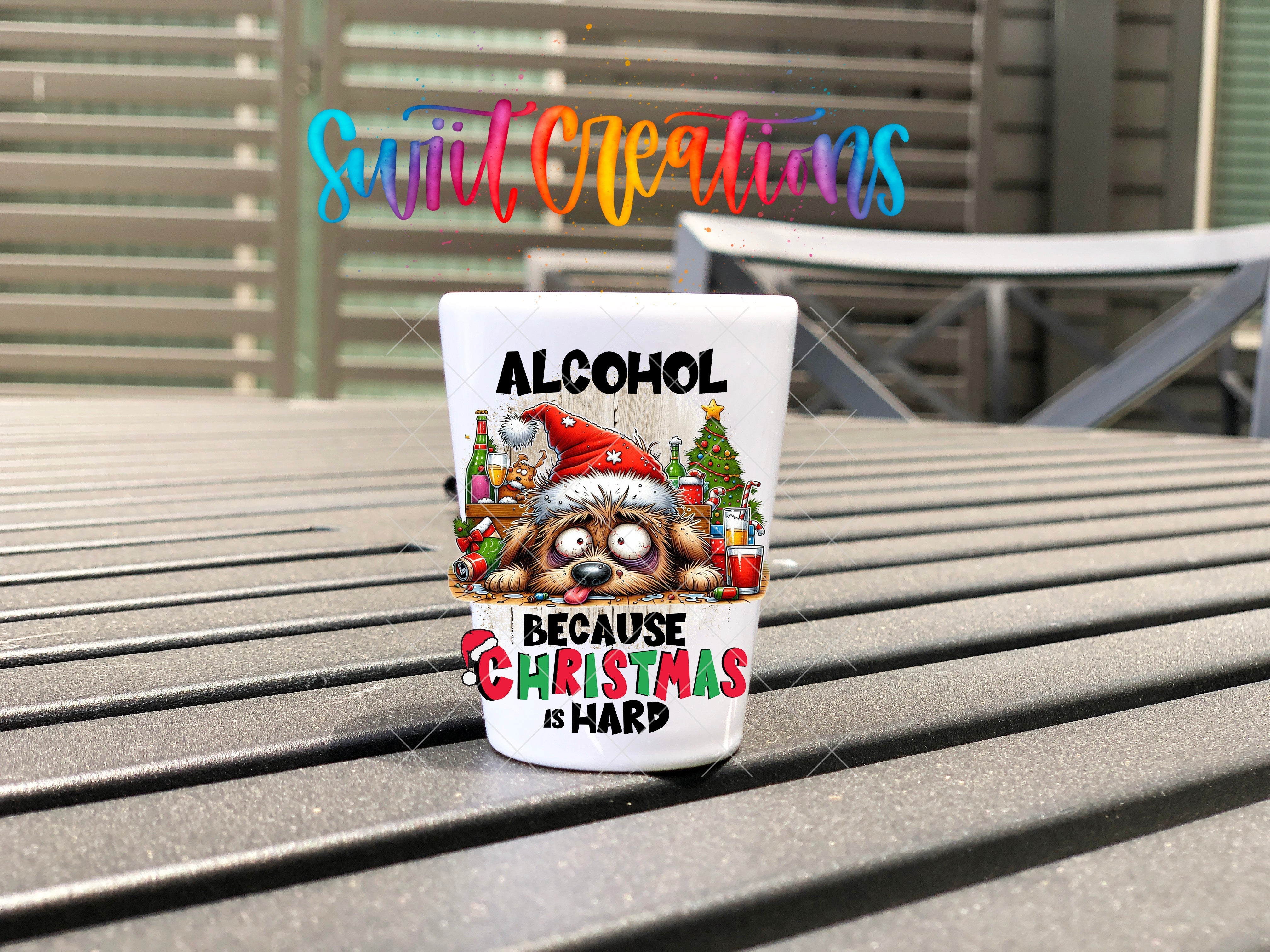 a cup of alcohol sitting on top of a table