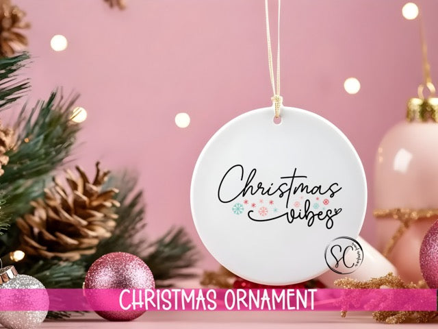 a christmas ornament hanging from a christmas tree