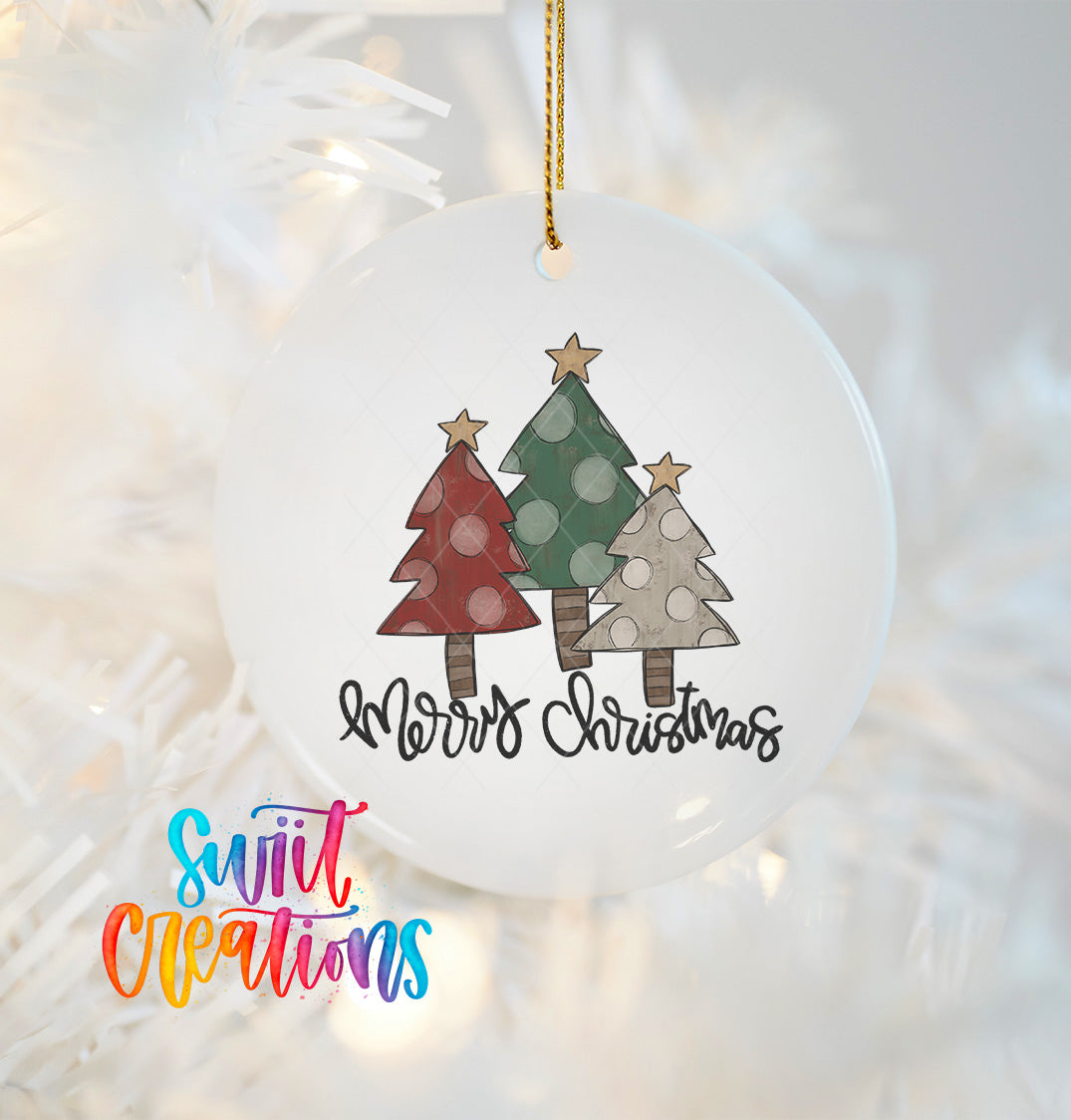 A white Christmas ornament with a festive design of three trees with polka dots and a "Merry Christmas" message.