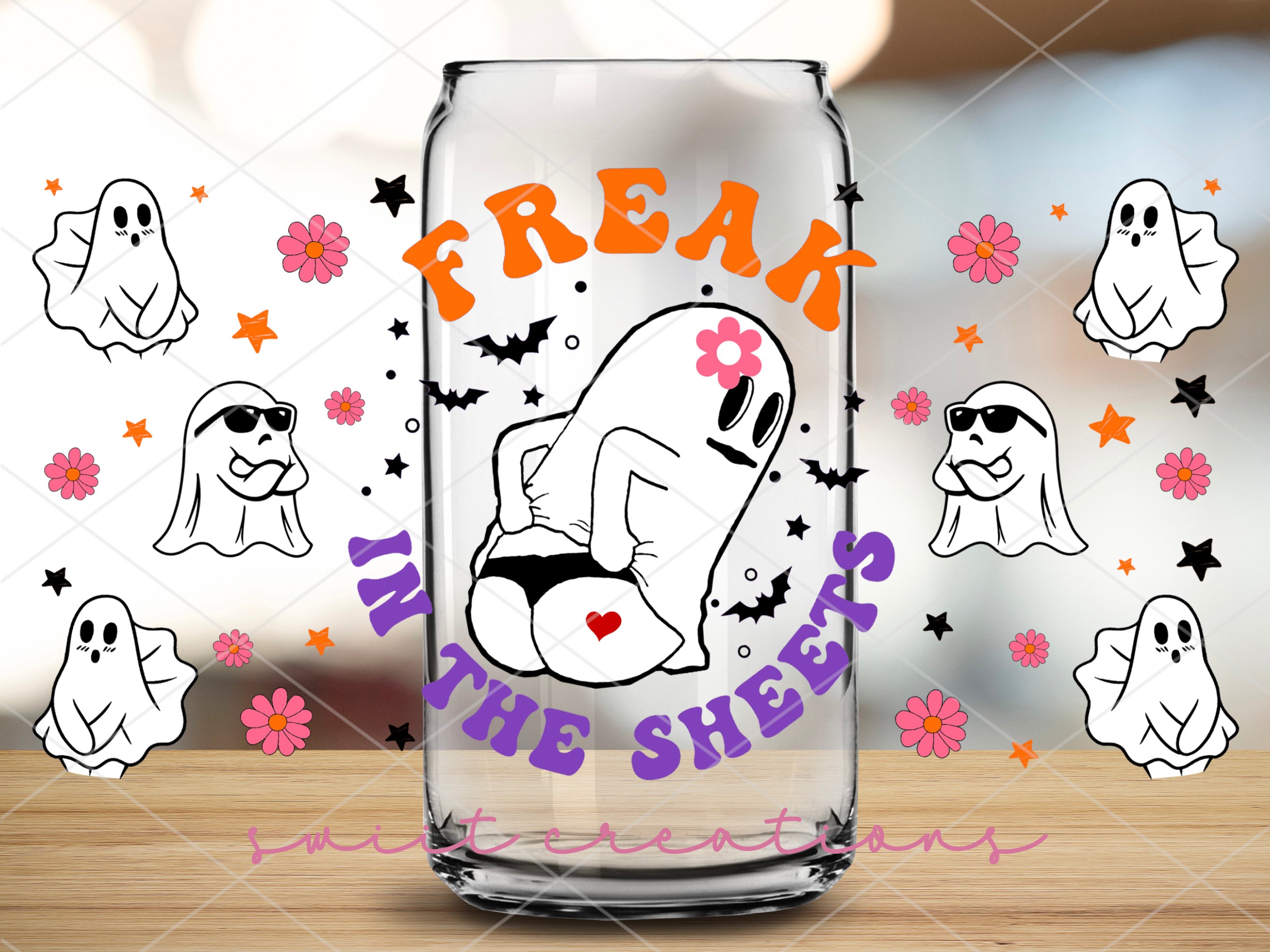a glass with a picture of a ghost on it