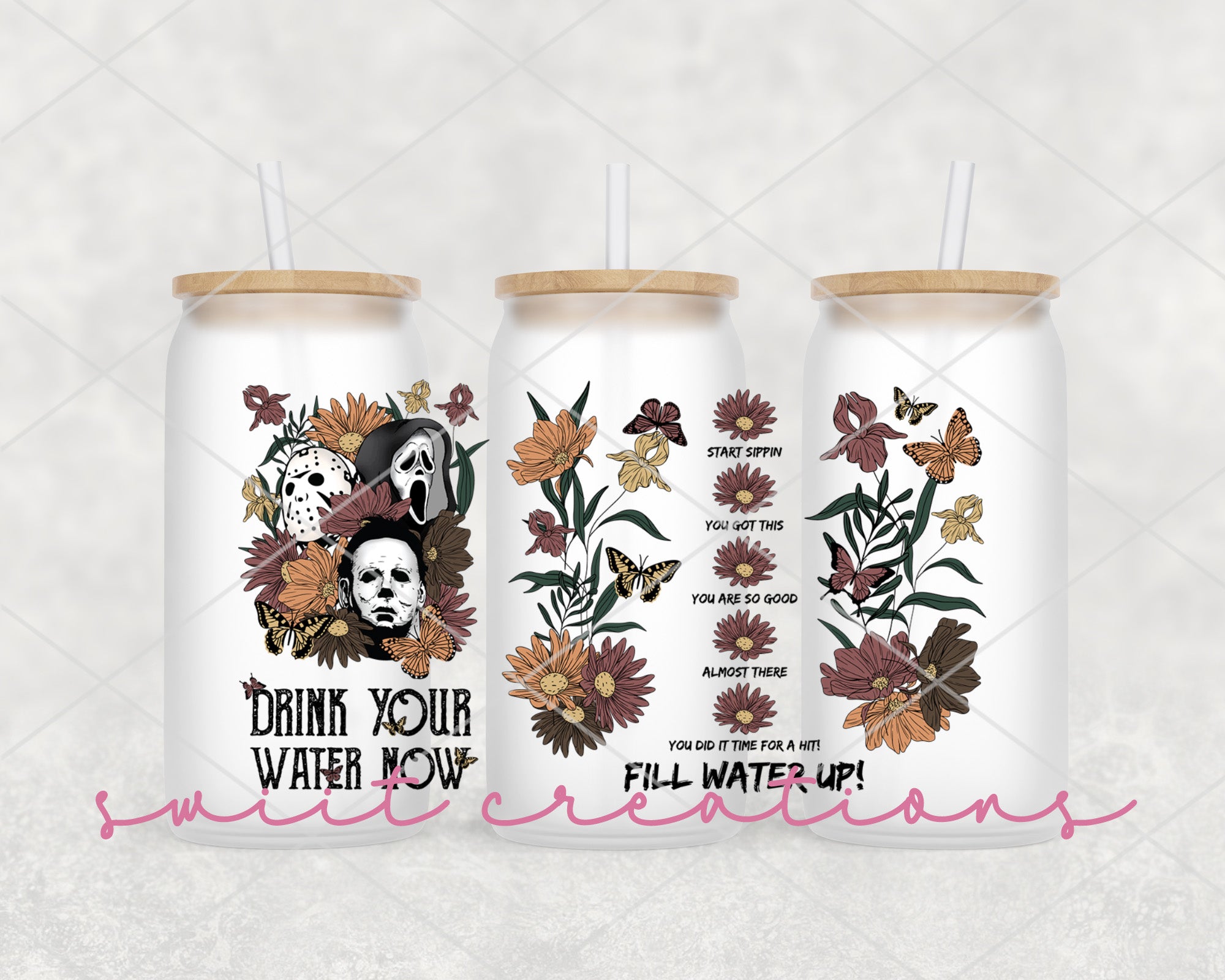three cans of water with stickers on them
