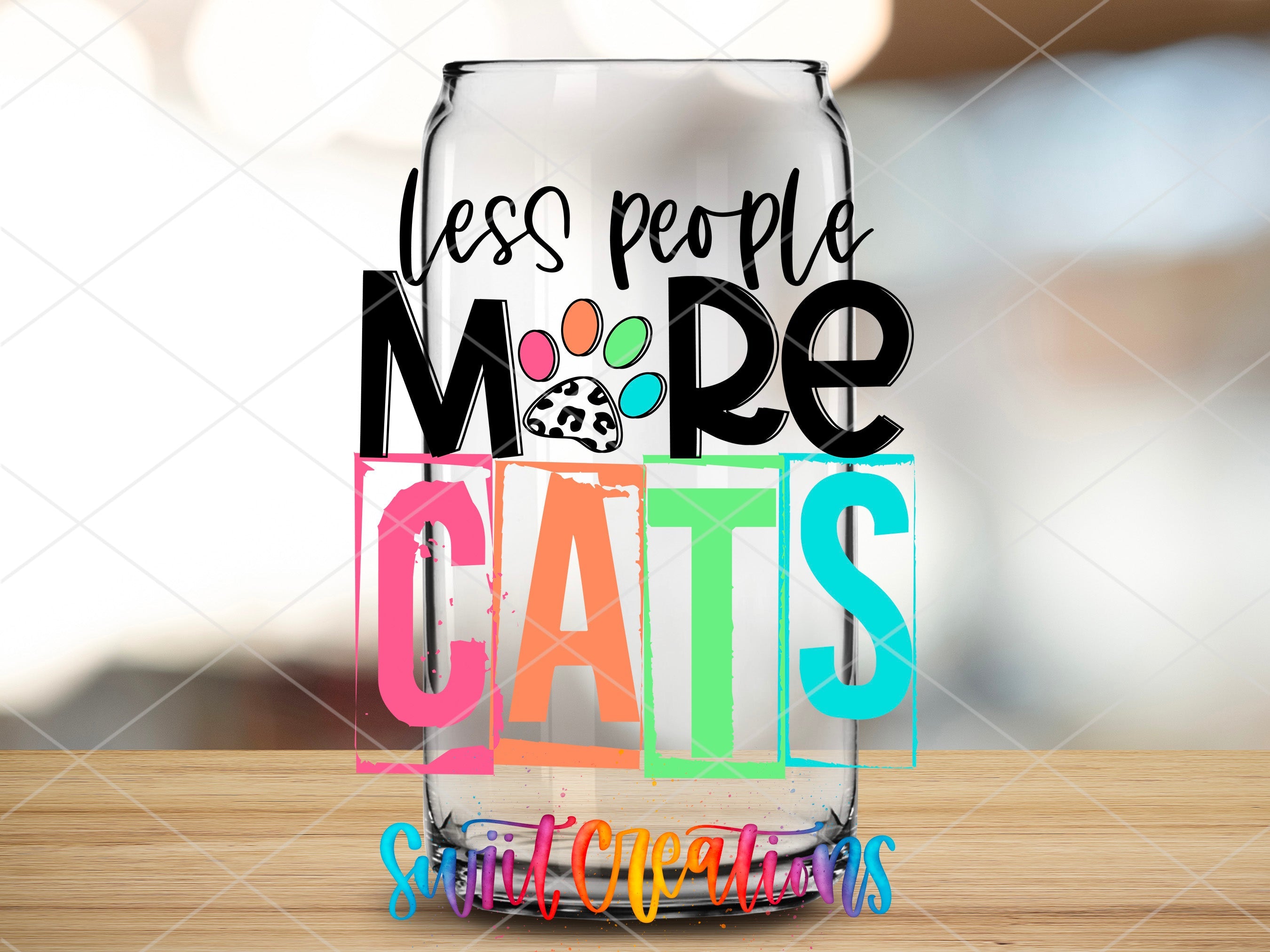 a glass with the words less people more cats on it