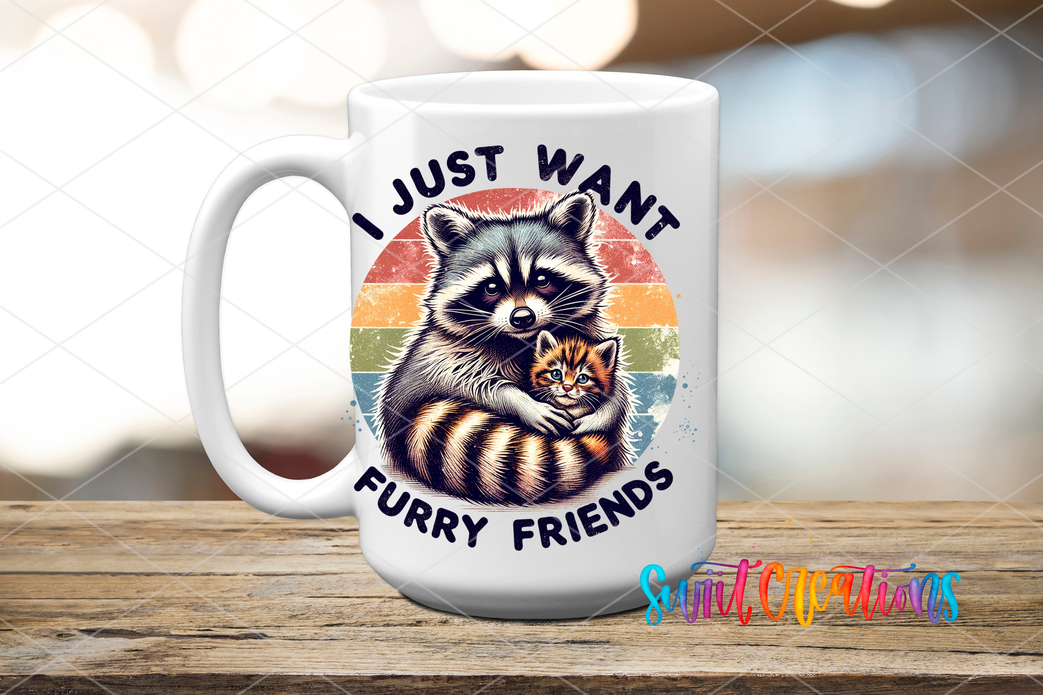 A white ceramic mug with a printed design featuring a raccoon and a kitten, along with the text "I JUST WANT FURRY FRIENDS" and a rainbow-colored background.