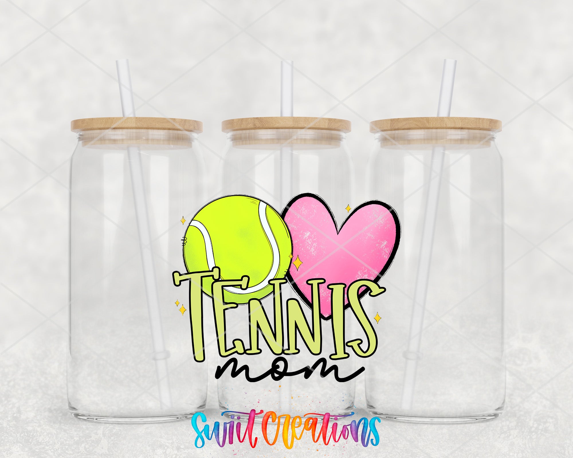 three clear glass jars with wooden lids, each with a straw, arranged in a row. The jars are labeled "Tennis mom" in a colorful, stylized font.